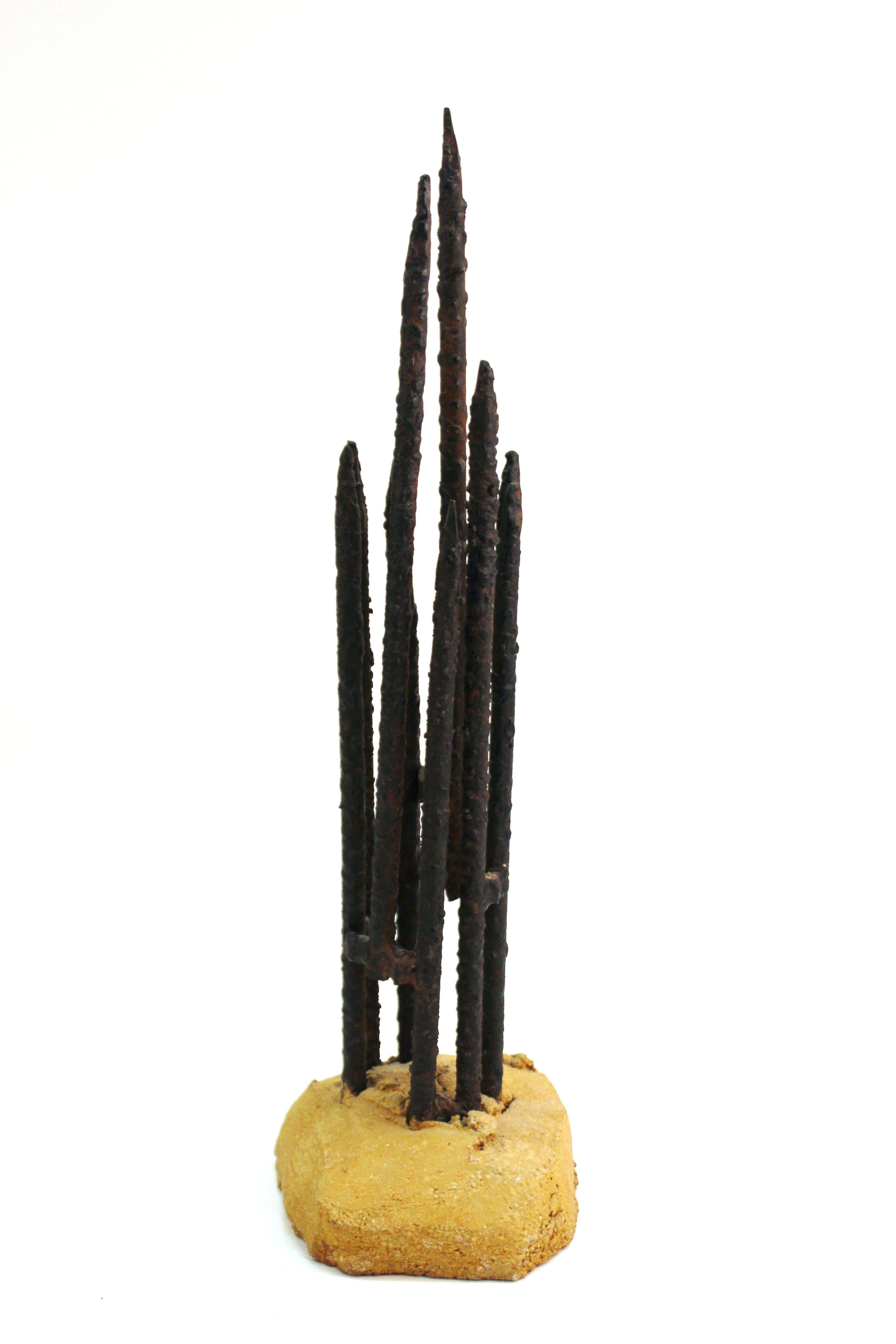 Brutalist modern metal tabletop sculpture with a set of rough metal spikes set in a composite base. The base is signed 'Matias' on the back. In great vintage condition with age-appropriate wear and use.