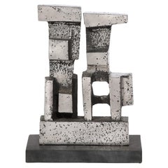 Sculpture géométrique brutaliste et moderniste en acier inoxydable moulé signée Paul Mount 