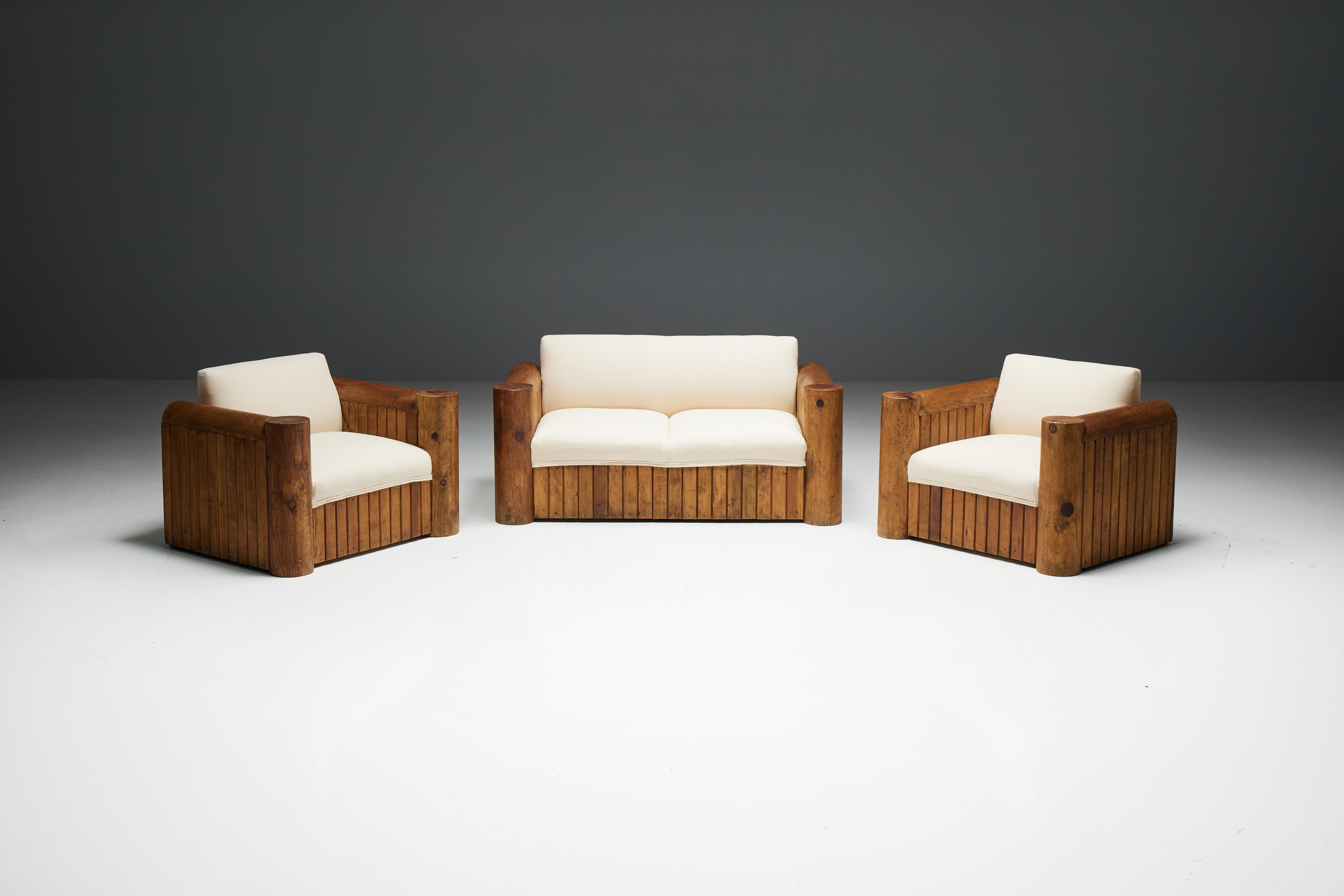 Brutalist naive lounge chairs, a fusion of rugged elegance and modern comfort. Made from the finest Alpine Oregon pine sourced from the majestic Pyrenees Mountains, these armchairs exude brutalist charm. The chairs are carefully upholstered in white