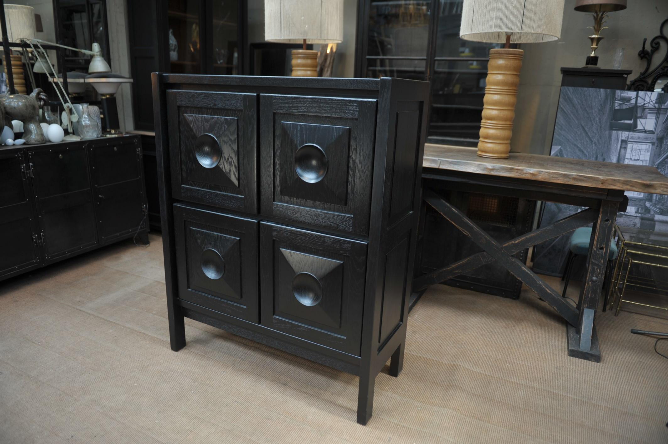 4 doors black lacquered brutalist cabinet with 4 inside removable shelves all in excellent condition, Circa 1970, weight 58 kg.