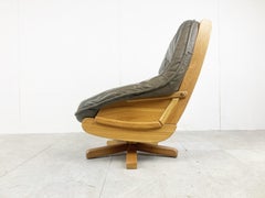 Brutalist Oak and Leather Swivel Chair, 1970s