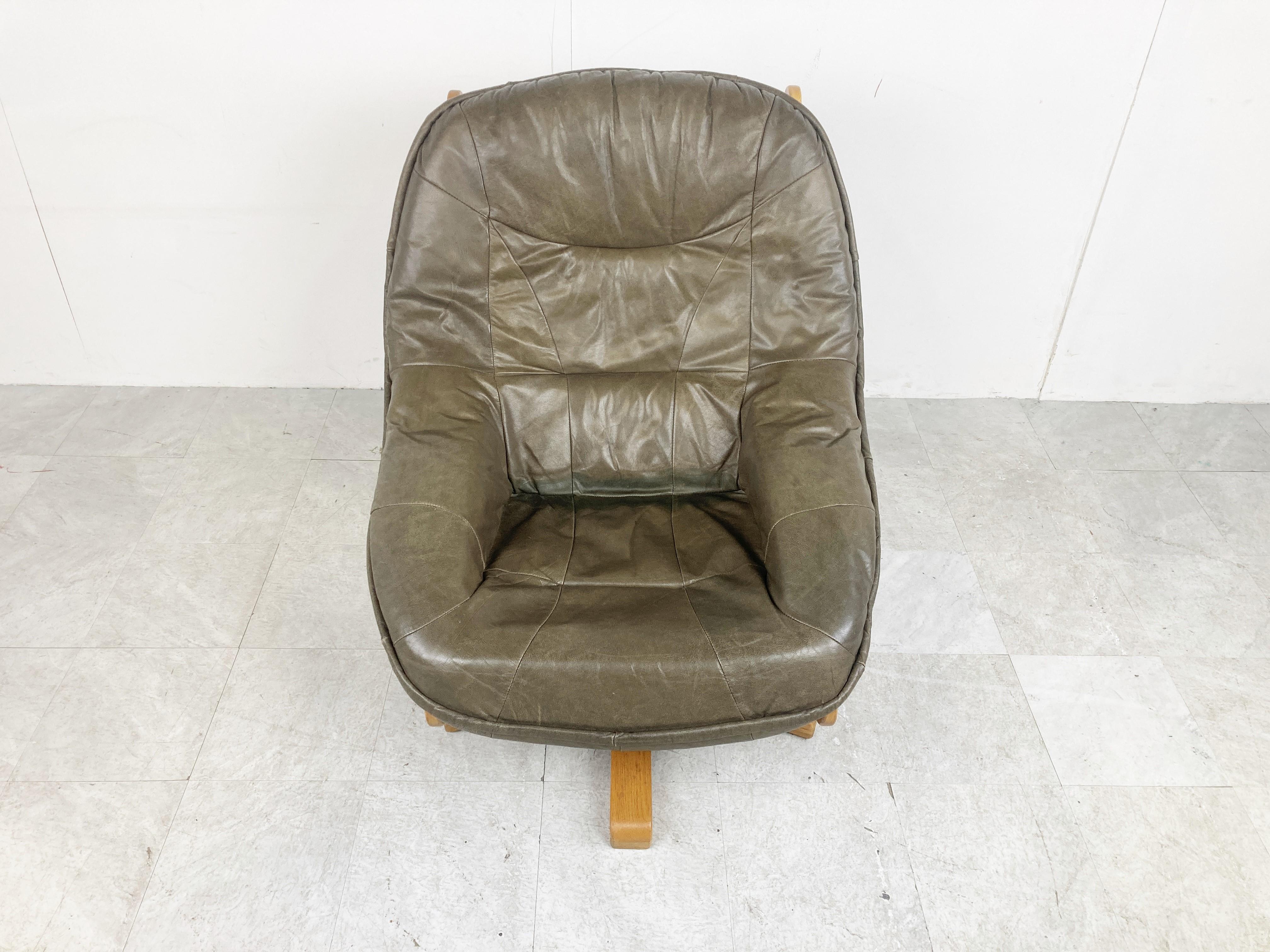 German Brutalist Oak and Leather Swivel Chair, 1970s For Sale