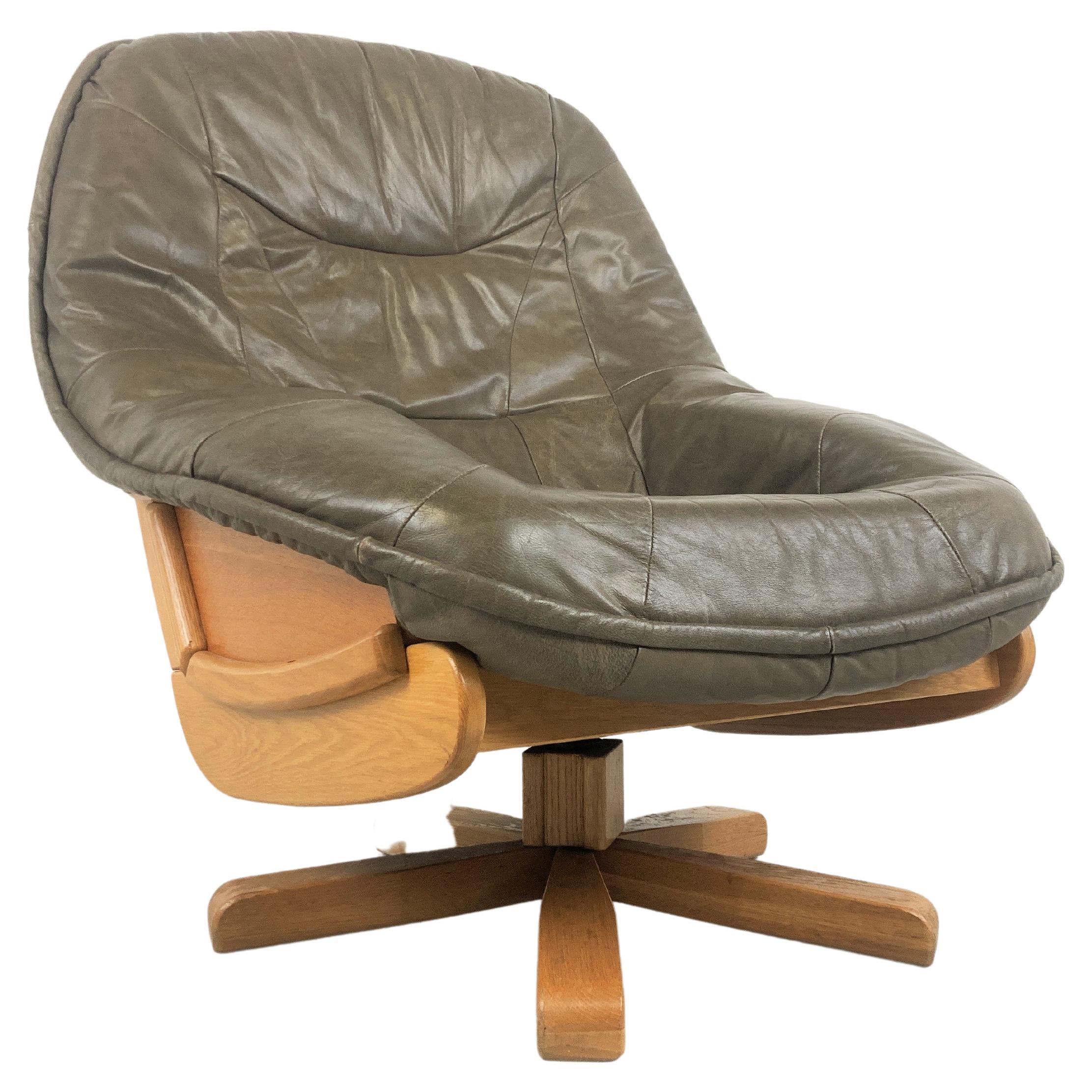 Brutalist Oak and Leather Swivel Chair, 1970s For Sale