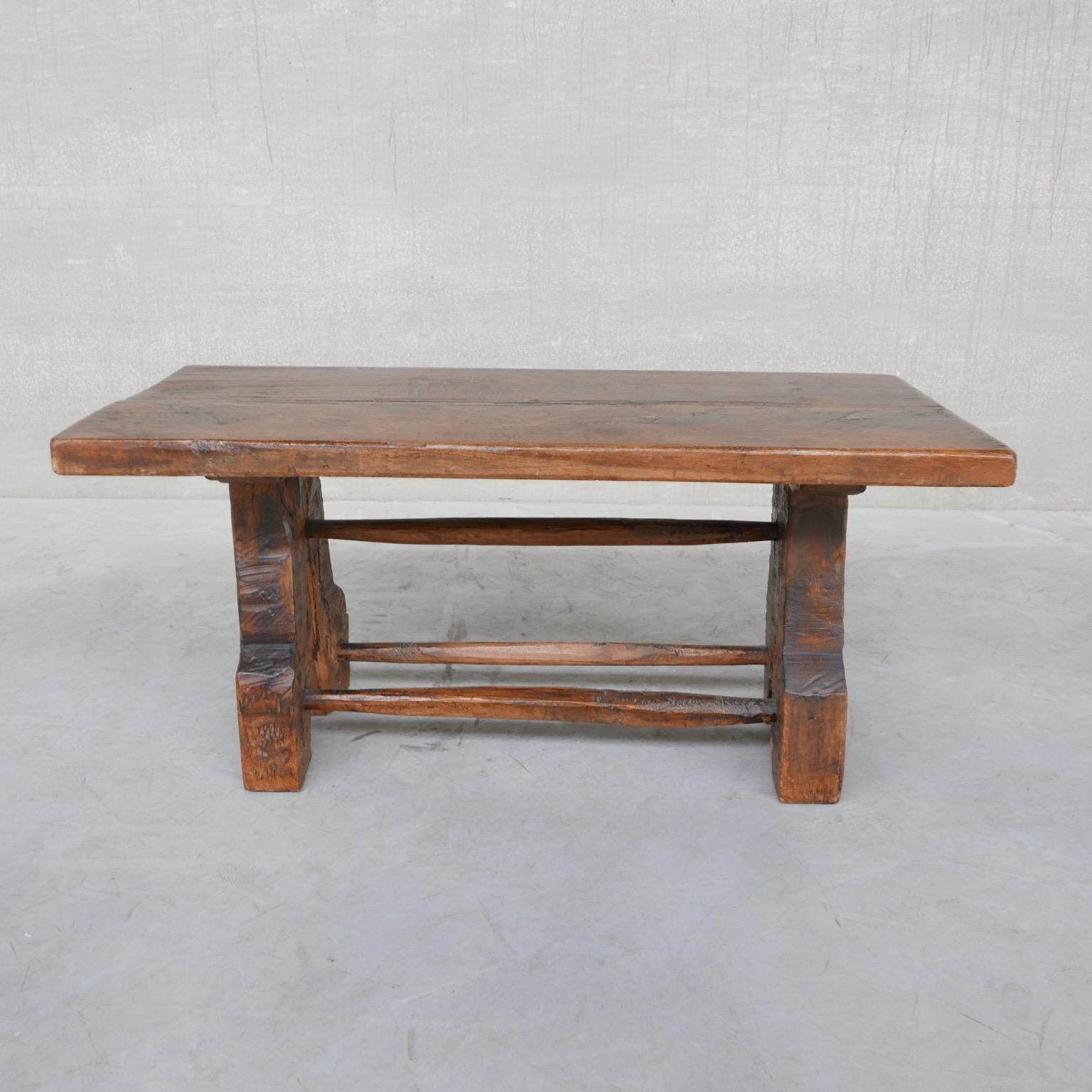 An exceptional oak coffee table. 

Naively made with peg stretchers. 

Belgium, c1950s. 

Wonderful patina. 

Wear commensurate with age.

Location: Belgium Gallery. 

Dimensions: 120 W x 58 D x 55 H in cm. 

Delivery: POA

We can