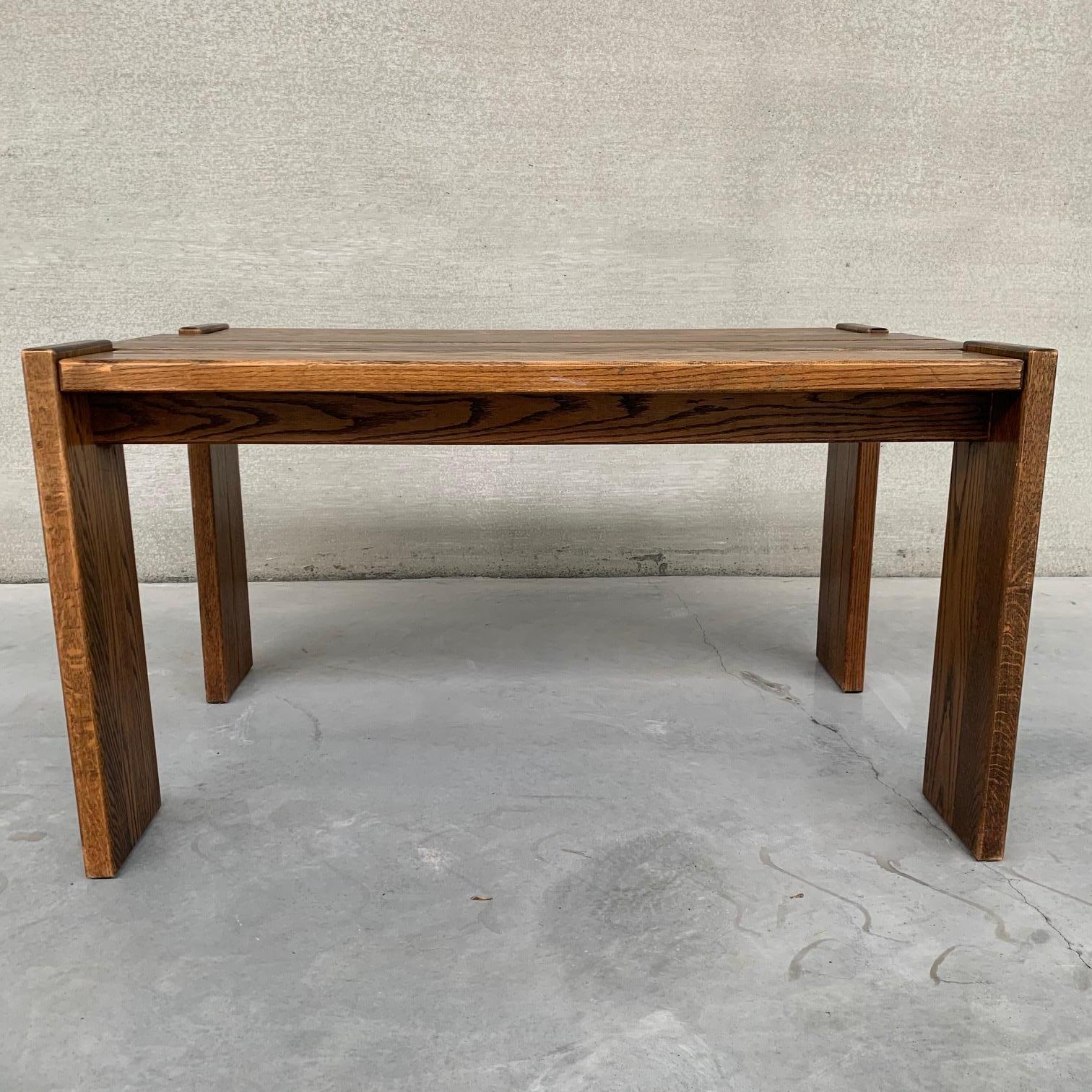 An oak brutalist style dining table. 

Belgium, c1970s. 

Good condition, some aging to the top. 

Location: Belgium Location

Dimensions: 90 D x 140 W x 74.5 total height x 72.5 table height in cm. 

Delivery: POA, We can ship around the