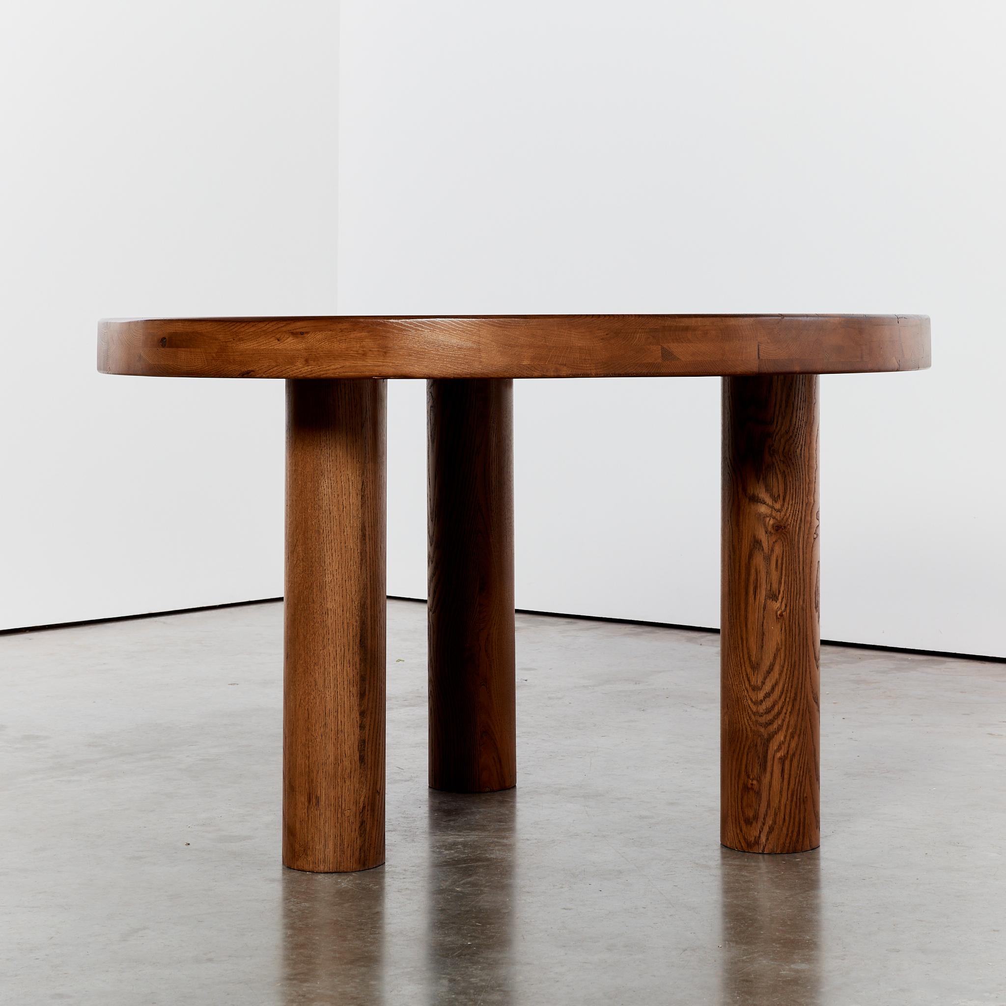 20th Century Brutalist Oak round dining table tripod column legs, seats 4-6