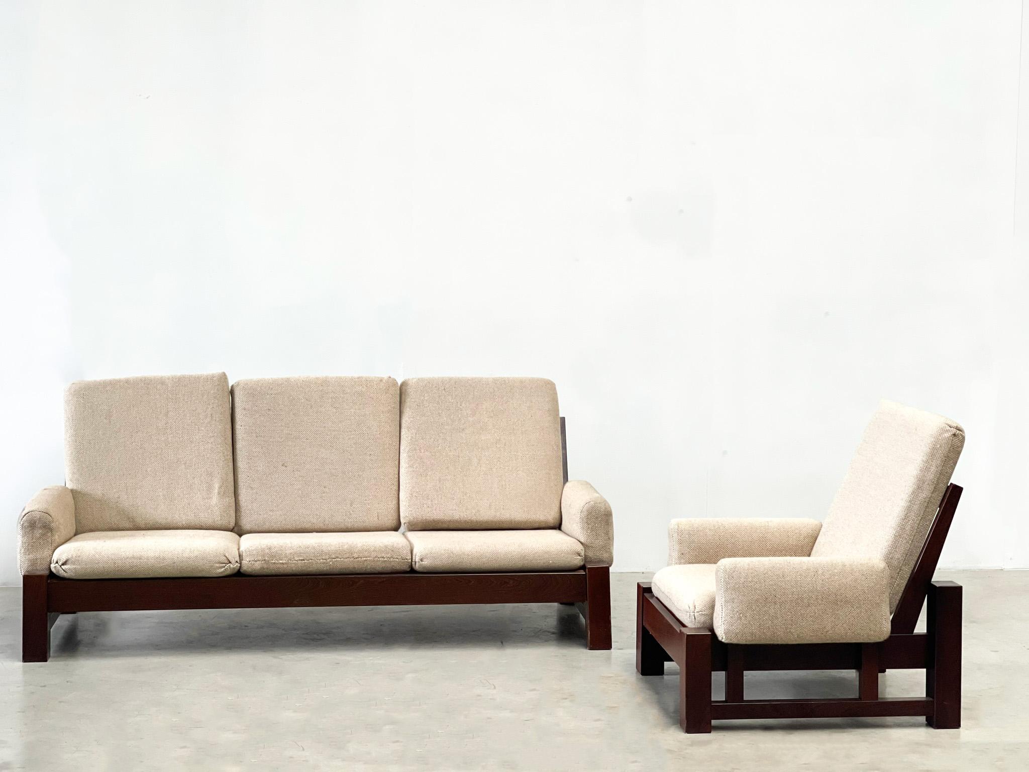 Very nice sofa set. This set is probably made in the Netherlands or Germany. They have a very brutalist frame and heavy frame. This gives them a very good look and fit perfectly in a modern interior. They still have the original fabric and this is