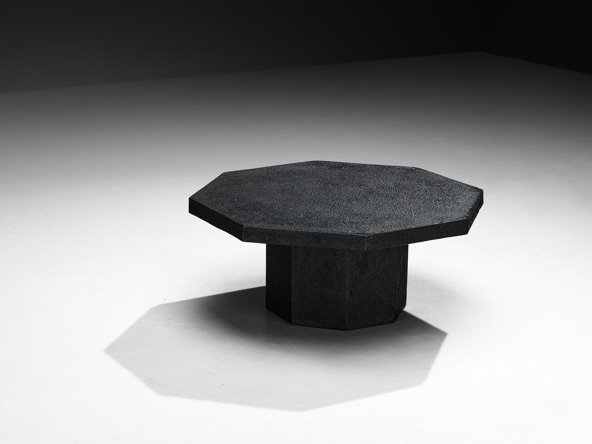 Cocktail or coffee table, resin, Northern-Europe, 1970s.

A striking example of 1970s design, this deep black coffee or cocktail table embodies a bold yet refined aesthetic. Crafted entirely from resin, the material mimics the rich texture and
