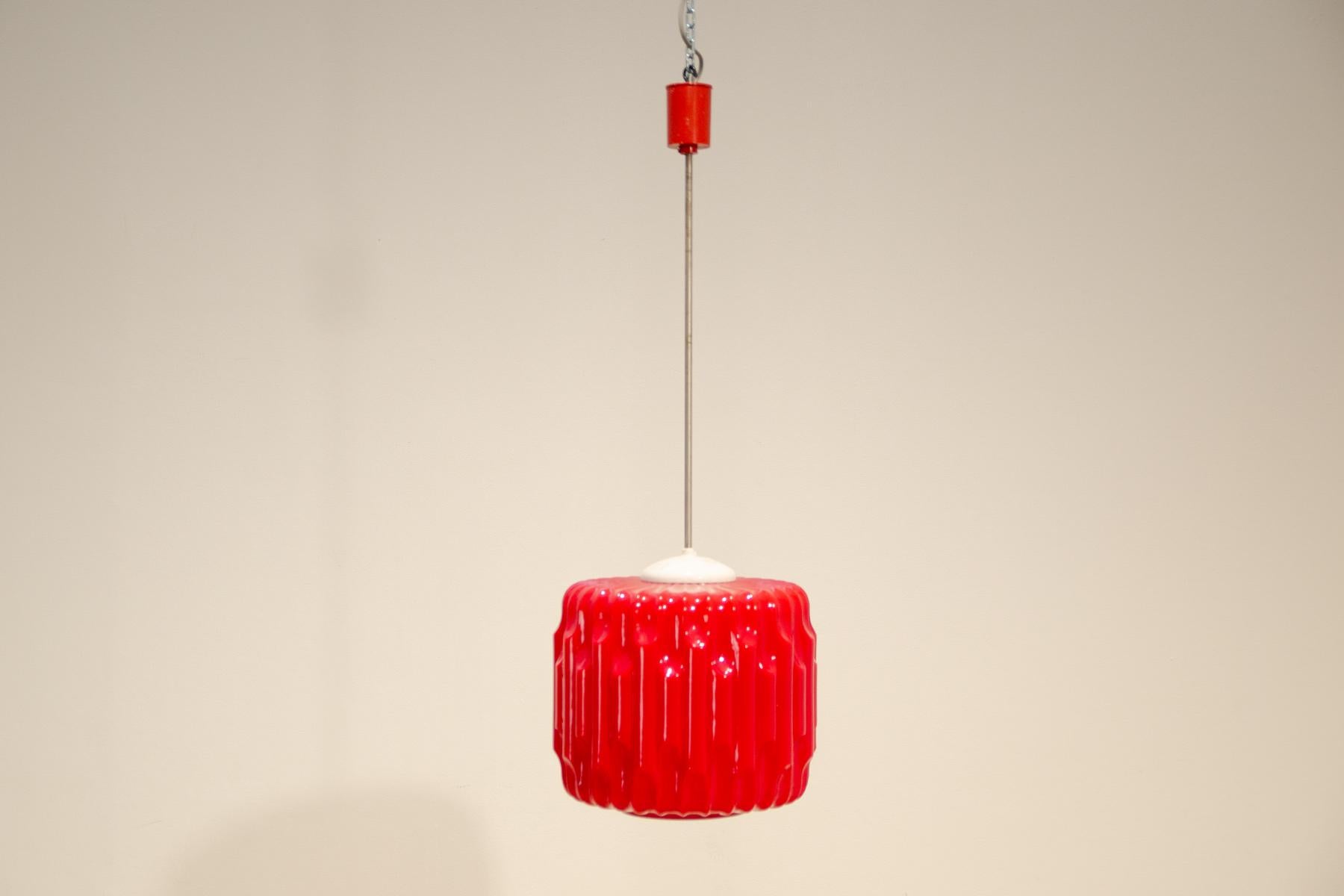 Brutalist opaline glass chandelier in a raspberry look designed by Czechoslovak architect Karl Wolf in the 1970s for the company Osvětlovací sklo company. Made of red opal glass and chrome construction. In excellent condition, fully functional, new
