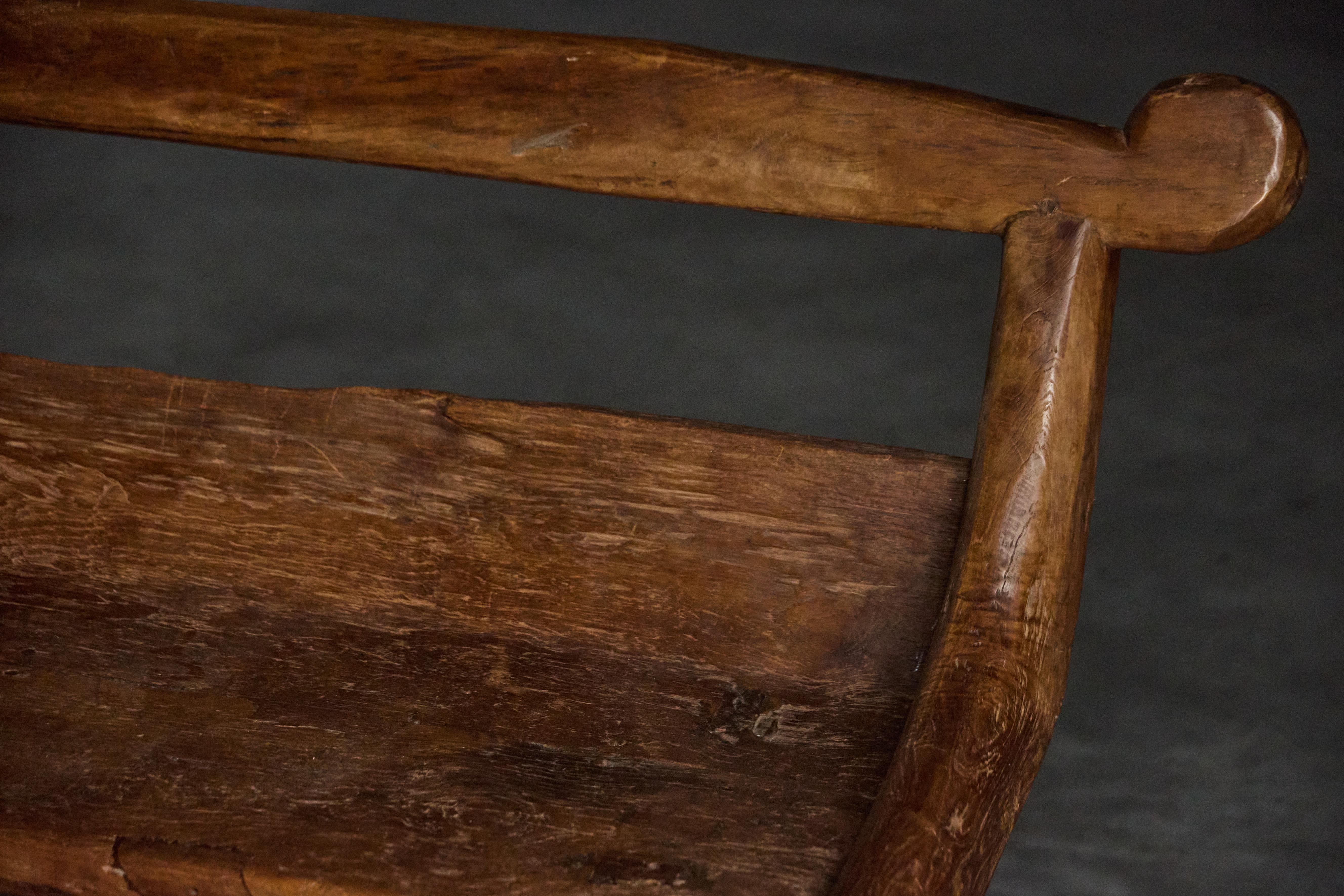 This striking wooden bench embodies the bold aesthetic of brutalist design, seamlessly blending raw textures with organic forms. Crafted from solid wood, its sculptural presence evokes timeless craftsmanship and natural beauty.