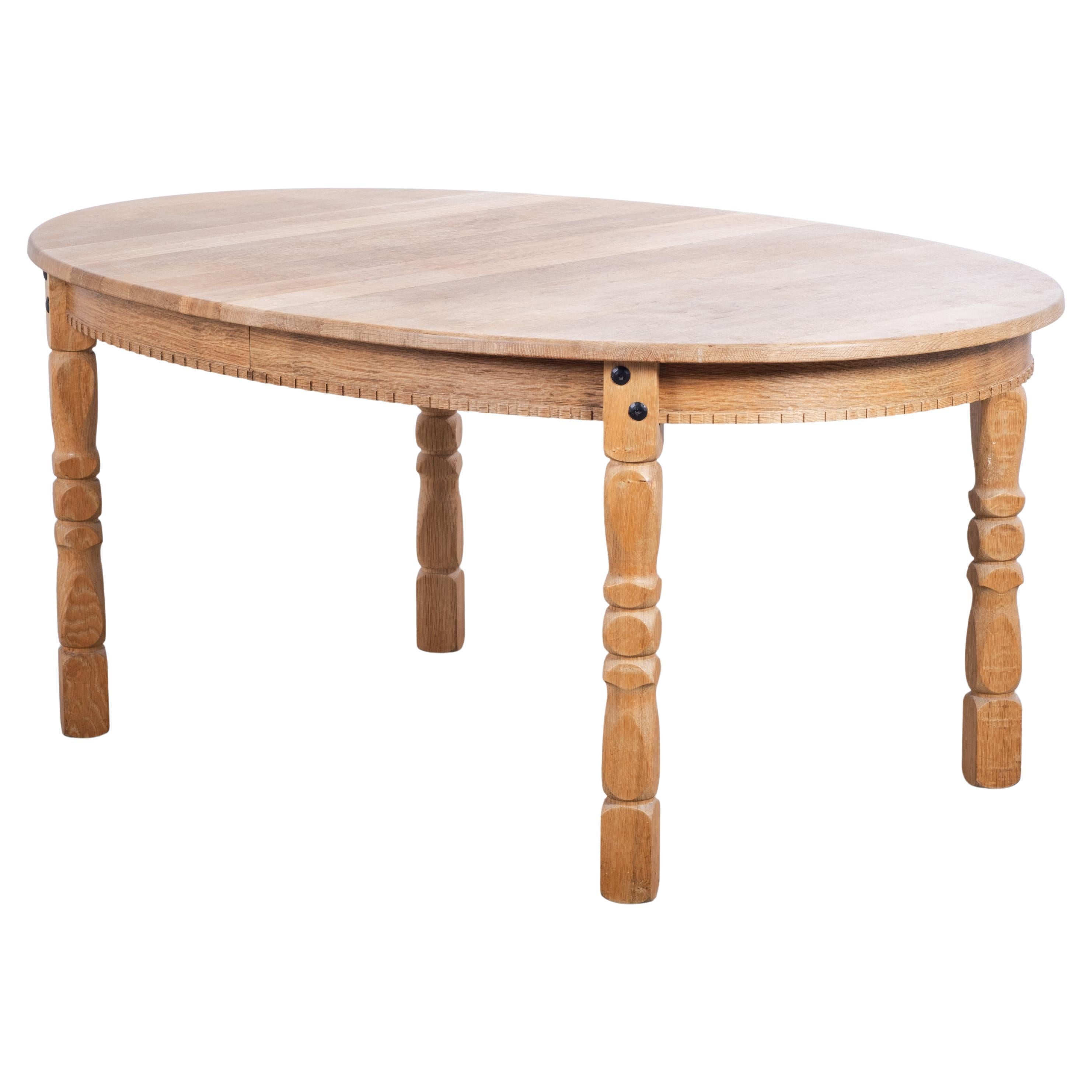 Brutalist Oval Oak Dining Table by Henning Kjærnulf, Denmark, 1960