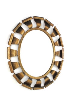 Brutalistischer ovaler Sunburst-Spiegel, vergoldetes Schmiedeeisen, 1950