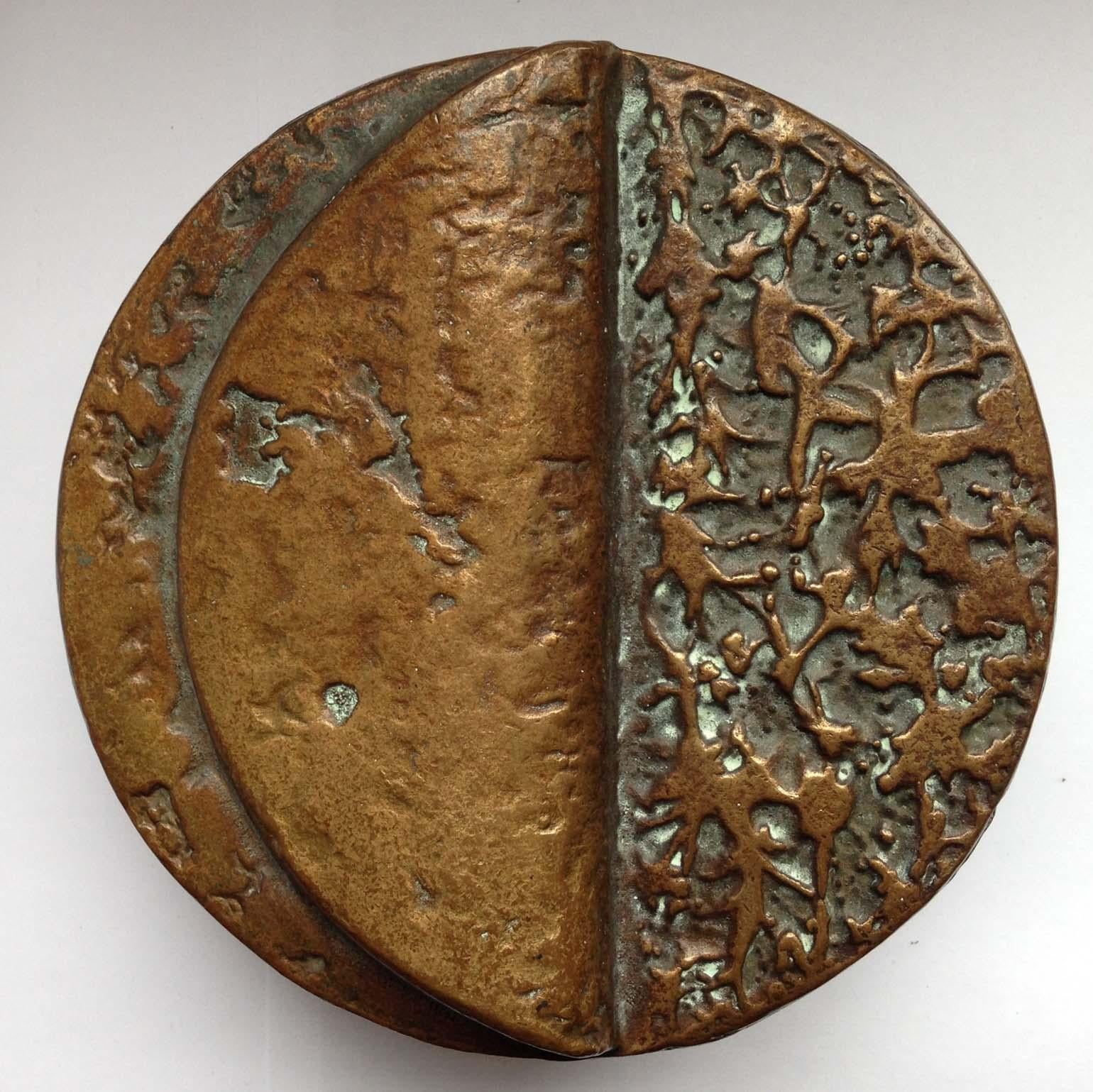 Bronze cast pair of round push & pull door handles with relief that looks like a folded page. They can be mounted on double doors or on a single door both ways.