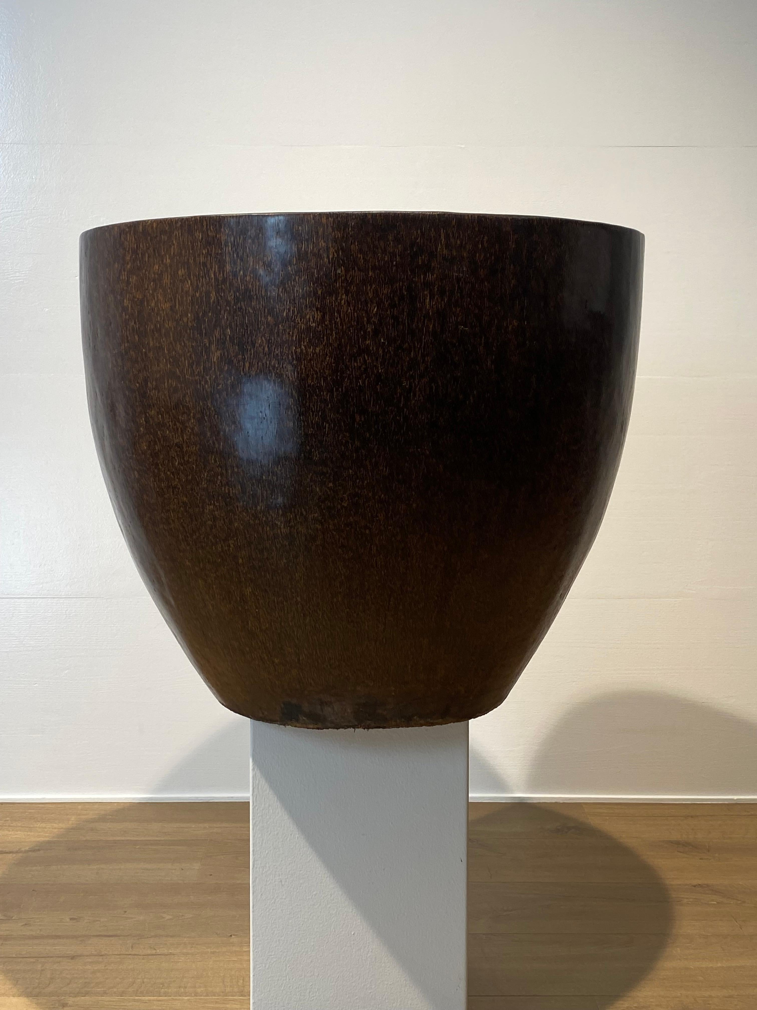 Brutalist Wooden Pot made from the trunk of a Palmtree,
nice and warm patina of the Palmtree Wood,
xl size, very decorative object  to be used for different purposes