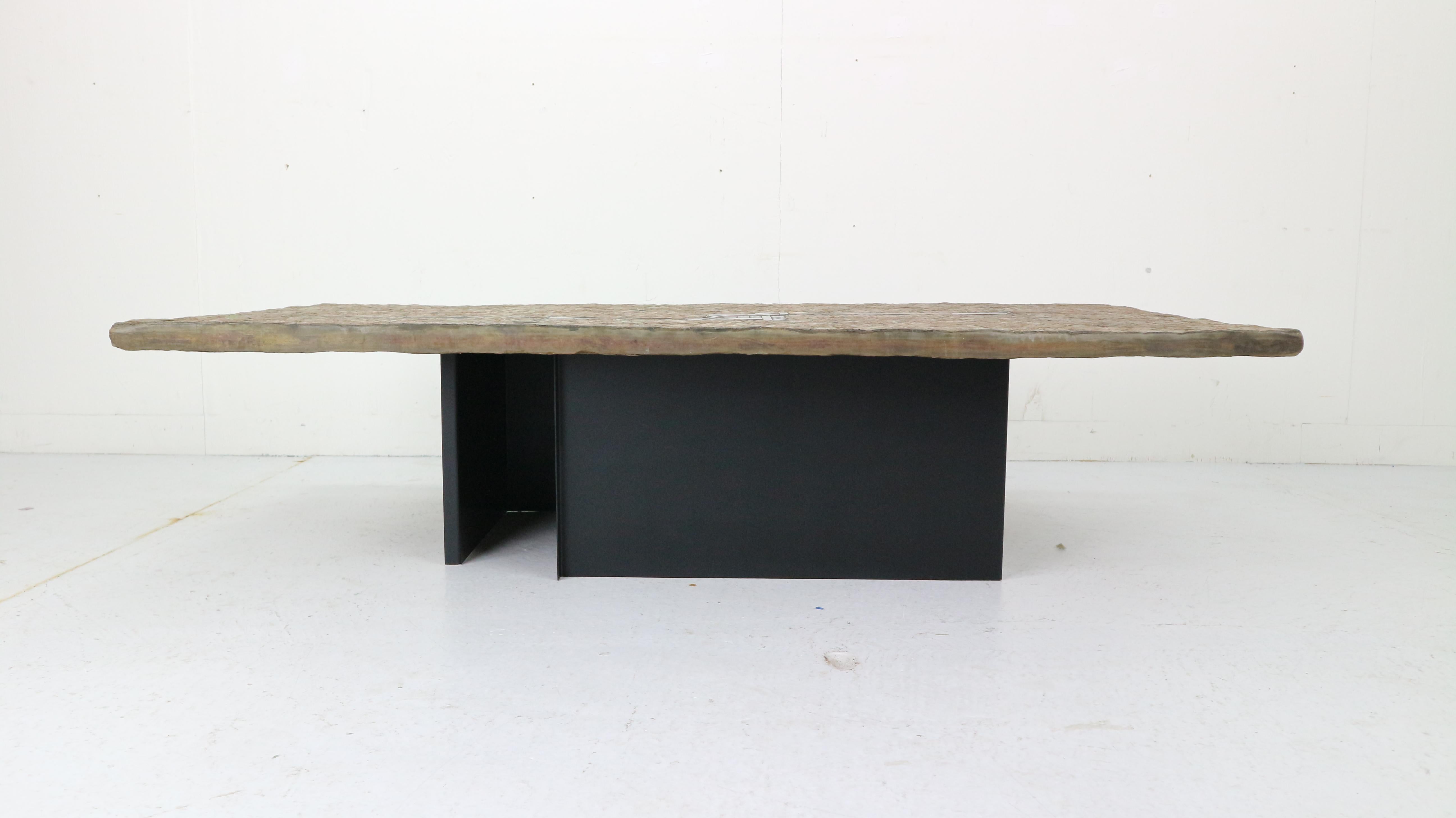 Fantastic and unique Paul Kingma ceramic art slate coffee table with metal foot. Made and signed in the 1980s. Paul Kingma was a famous Dutch sculptor. No other table has the same unique inlay as the table is one-off.

The table features a