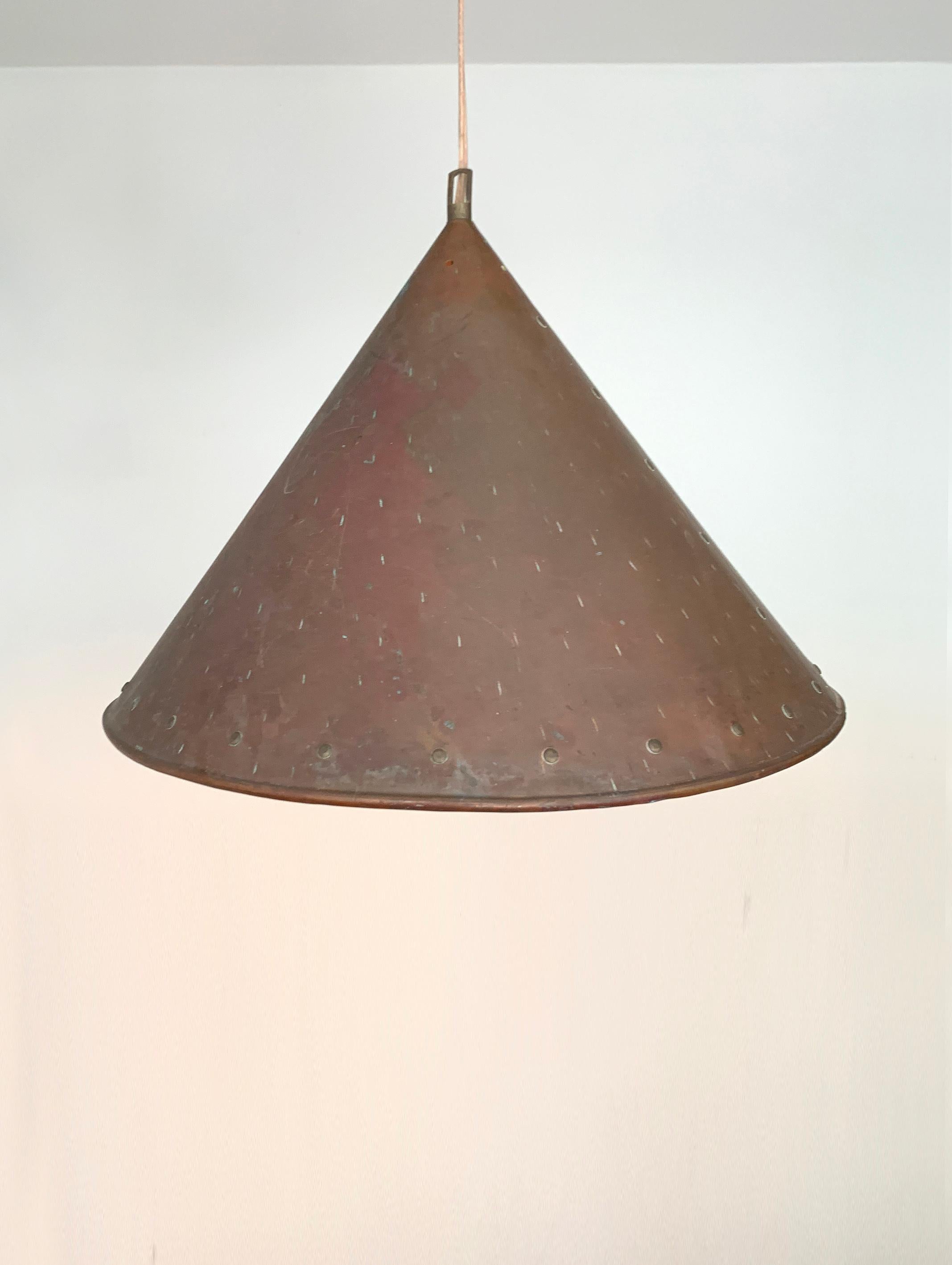 Mid-Century Brutalist pendant light made of patinated hand hammered copper. 

Scandinavian brutalist pendant light from the 1950s-60s. Made of hand-hammered copper, fits perfectly into the Wasi Sabi trend with its simplicity and authenticity.