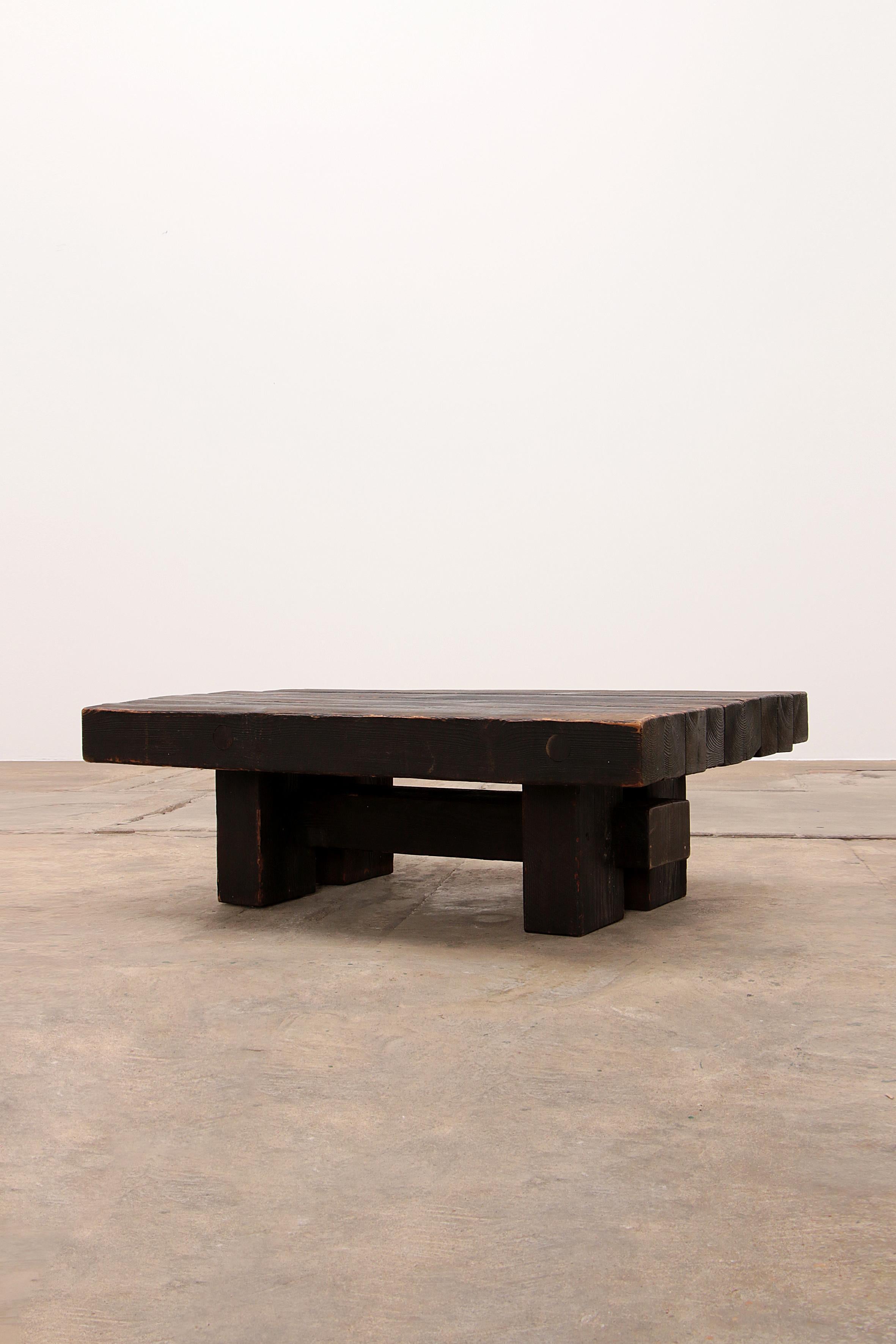 A beautiful coffee table made from old black Pomeranian pine, by Jens Lyngsøe for Havdrup Trævarefabrik.
Made from the wood of old demolished buildings such as a blue-and-yellow warehouse in Copenhagen, dated to around the year 1700.
The designer
