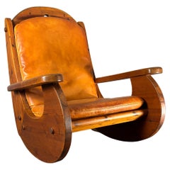Brutalist pine rocking lounge chair with leather seat by Wasa 1984