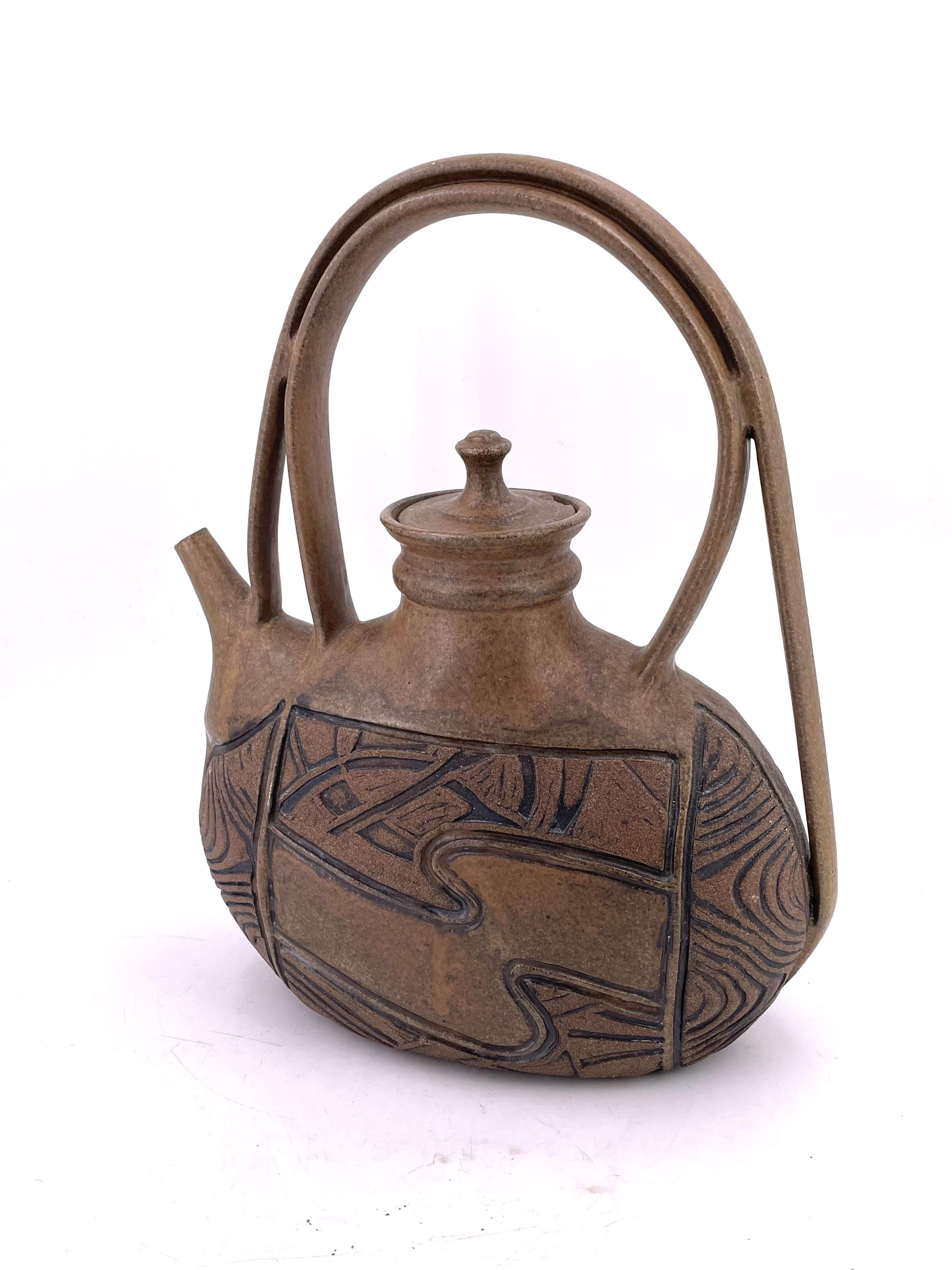 Beautiful ceramic pottery pitcher by Californian ceramist Phil Barr, circa 1995 signed nice design small chip on the lid as shown sold AS/IS condition.