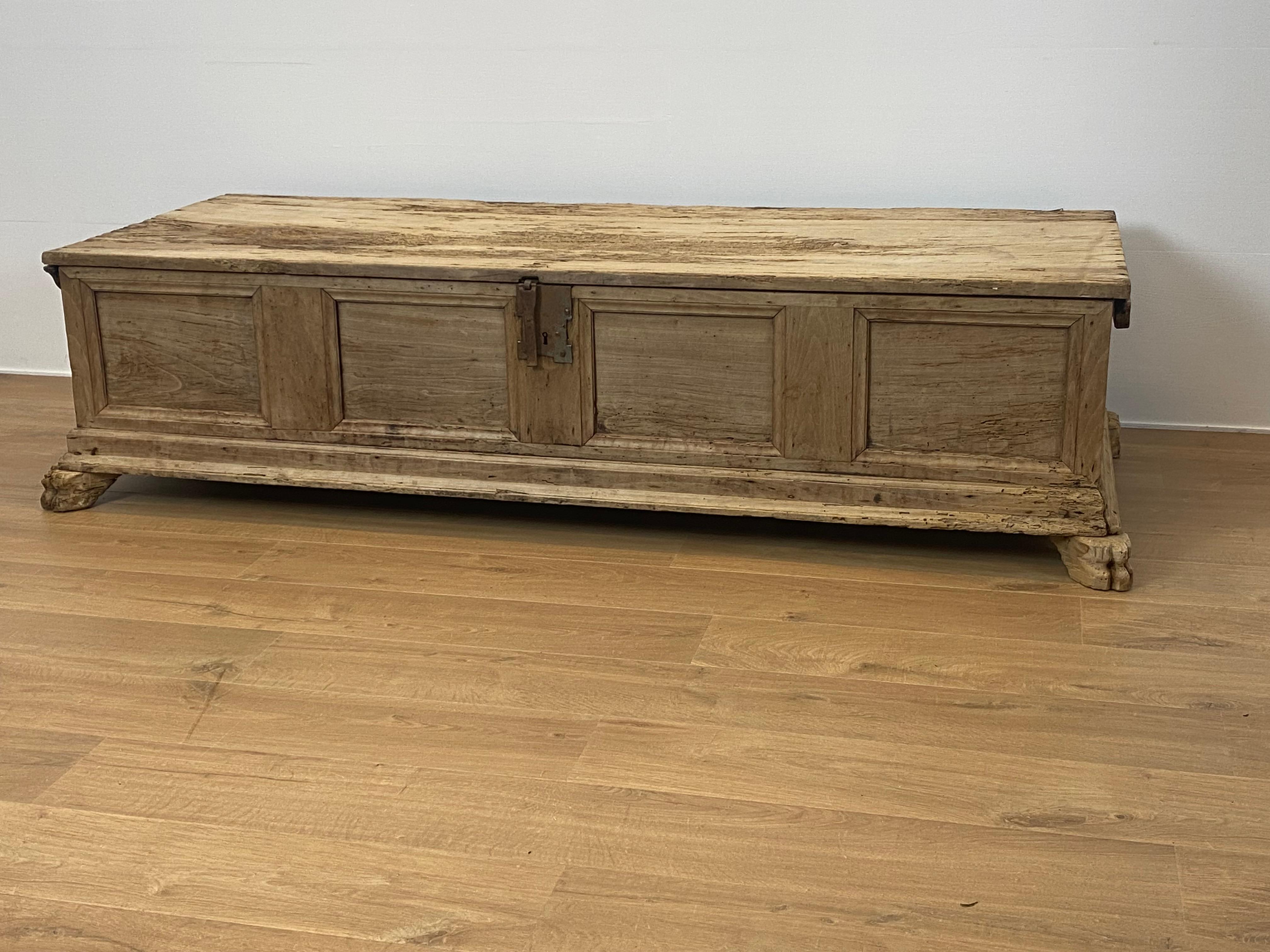 Exceptional Spanish Trunk in a bleached Chestnut Wood,from around 1890,

very simple lines and design, 4 panelled front , clawfeet and iron lock,

Can be used as a coffee table, beautiful and old wear of the wood.