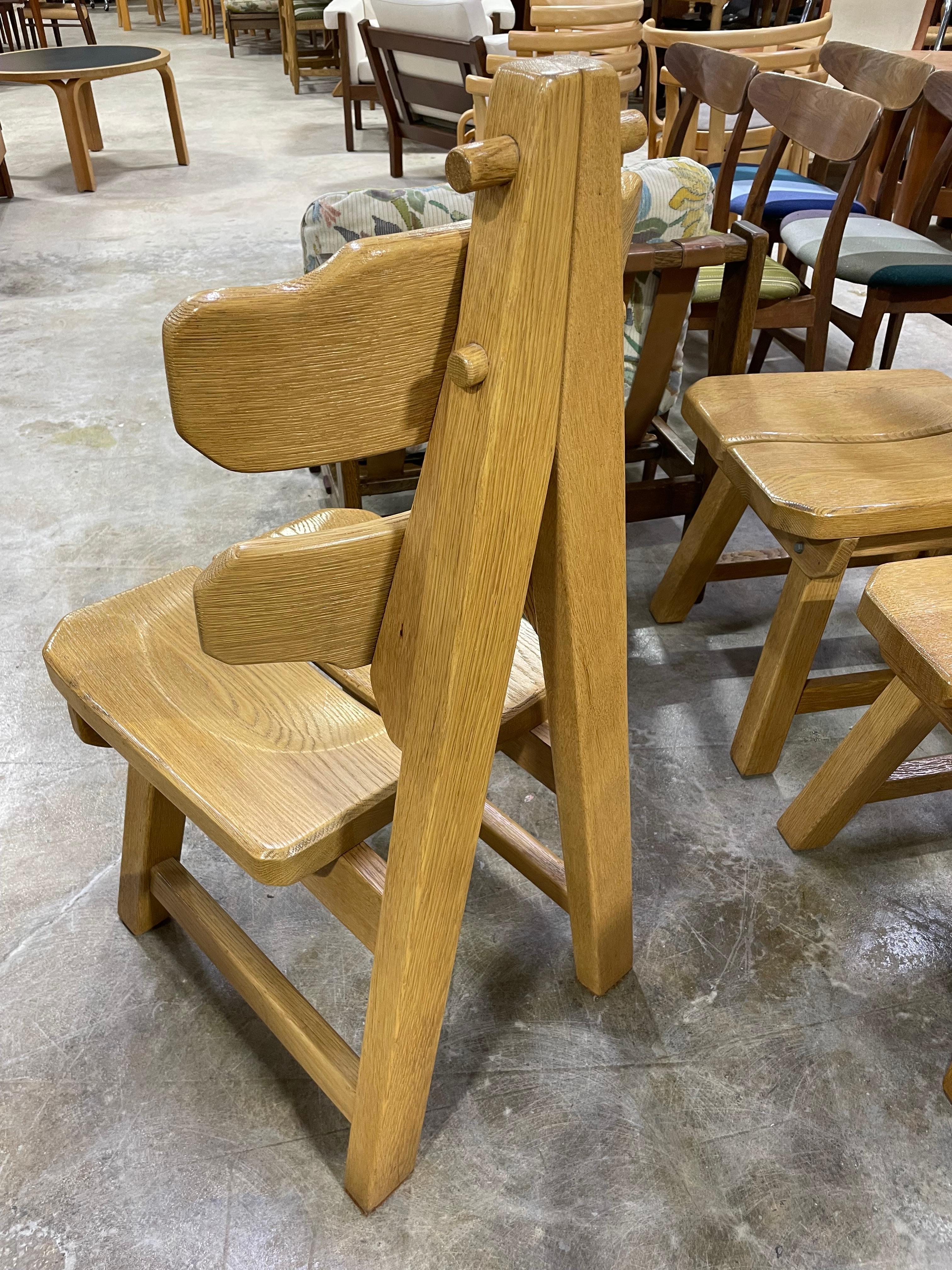 Rare set of oak dining chairs produced in Spain. Brutalist geometrical design. Super sturdy construction. Exposed joints.