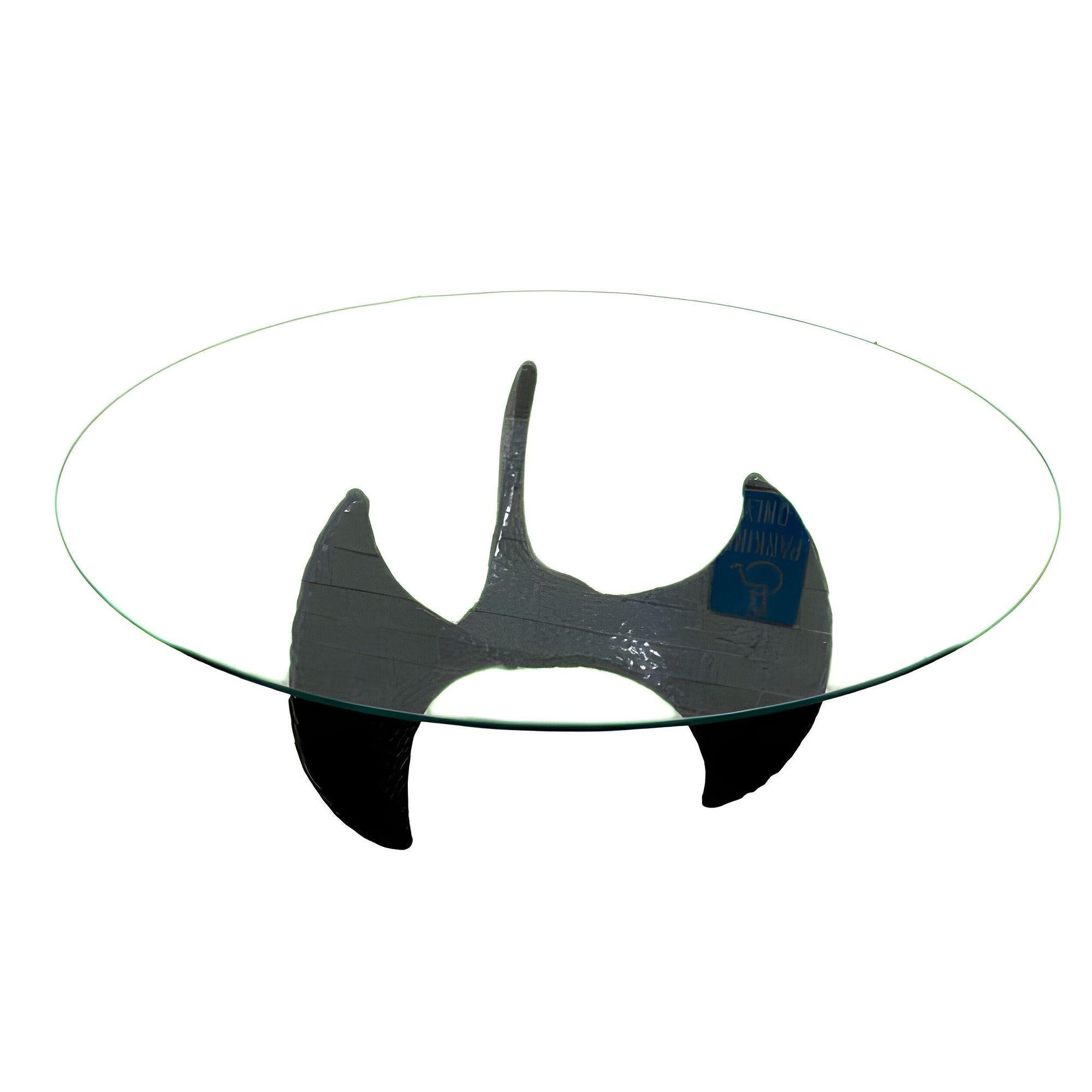 Mid-Century Propeller Coffee table made by the Universal Statuary Corp, Chicago IL. Cast resin with a black finish. A great late Modern statement piece with a hammered finish and a Brutalist form. This great transitional piece would easily be found