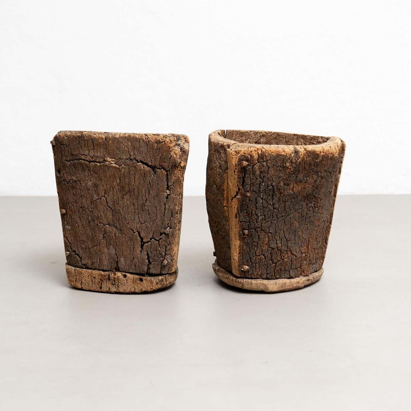Embark on a journey through time with this enchanting pair of trash bins, relics from the early 1940s. Crafted in the distinctive Brutalist style, their designs radiate simplicity and rustic allure.

The enduring charm of cork is palpable in their