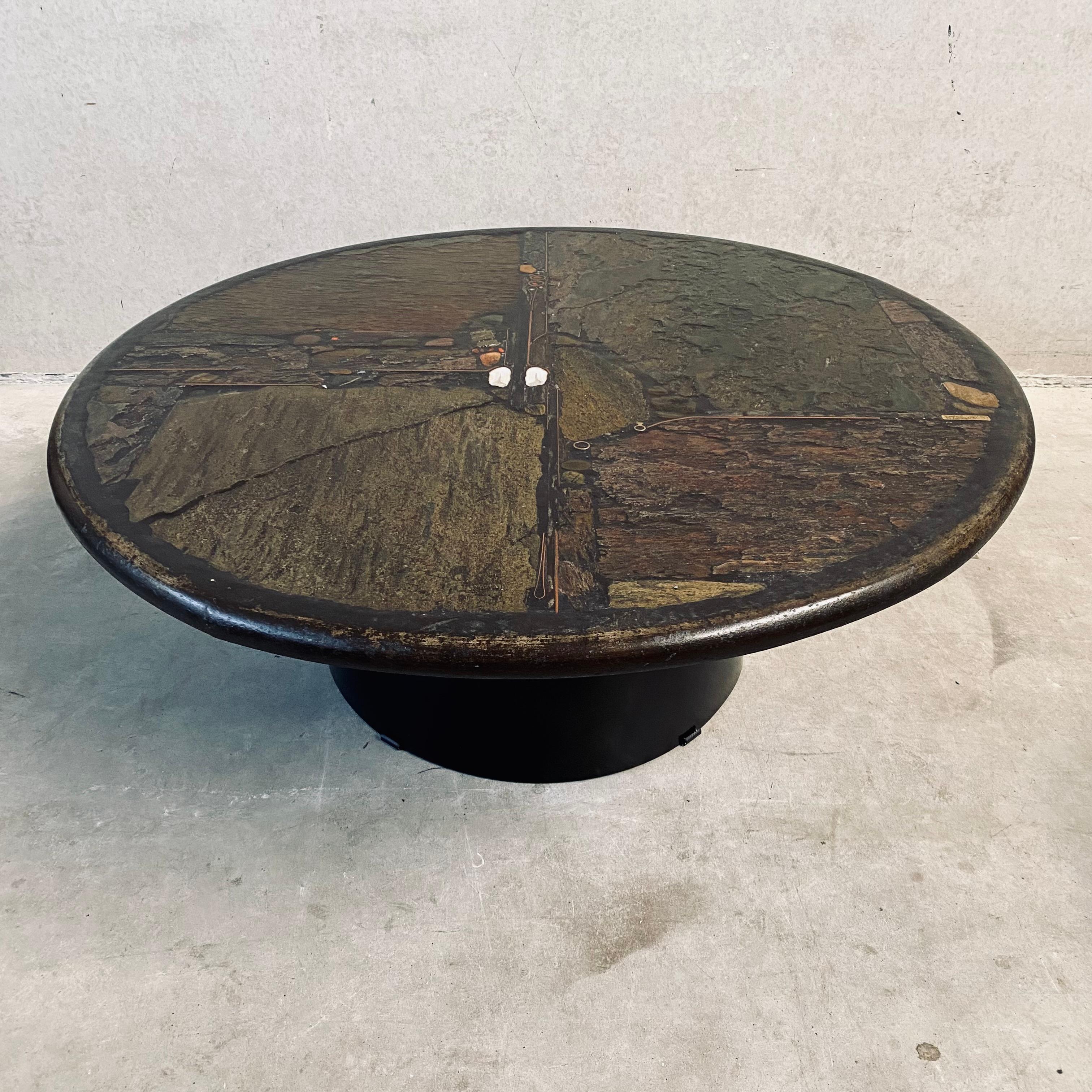 Brutalist coffee table designed and made by Paul Kingma, The Netherlands 1989.

Introducing the Brutalist Round Coffee Table by renowned sculptor Paul Kingma, crafted in the Netherlands in 1989. This iconic piece is a testament to Kingma's unique