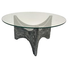 Table basse ronde brutaliste en fonte d'aluminium et verre éclairée