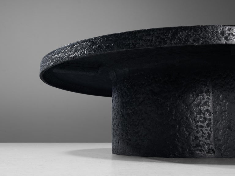 Brutalist Round Coffee Table in Black Stone Look Resin For Sale at