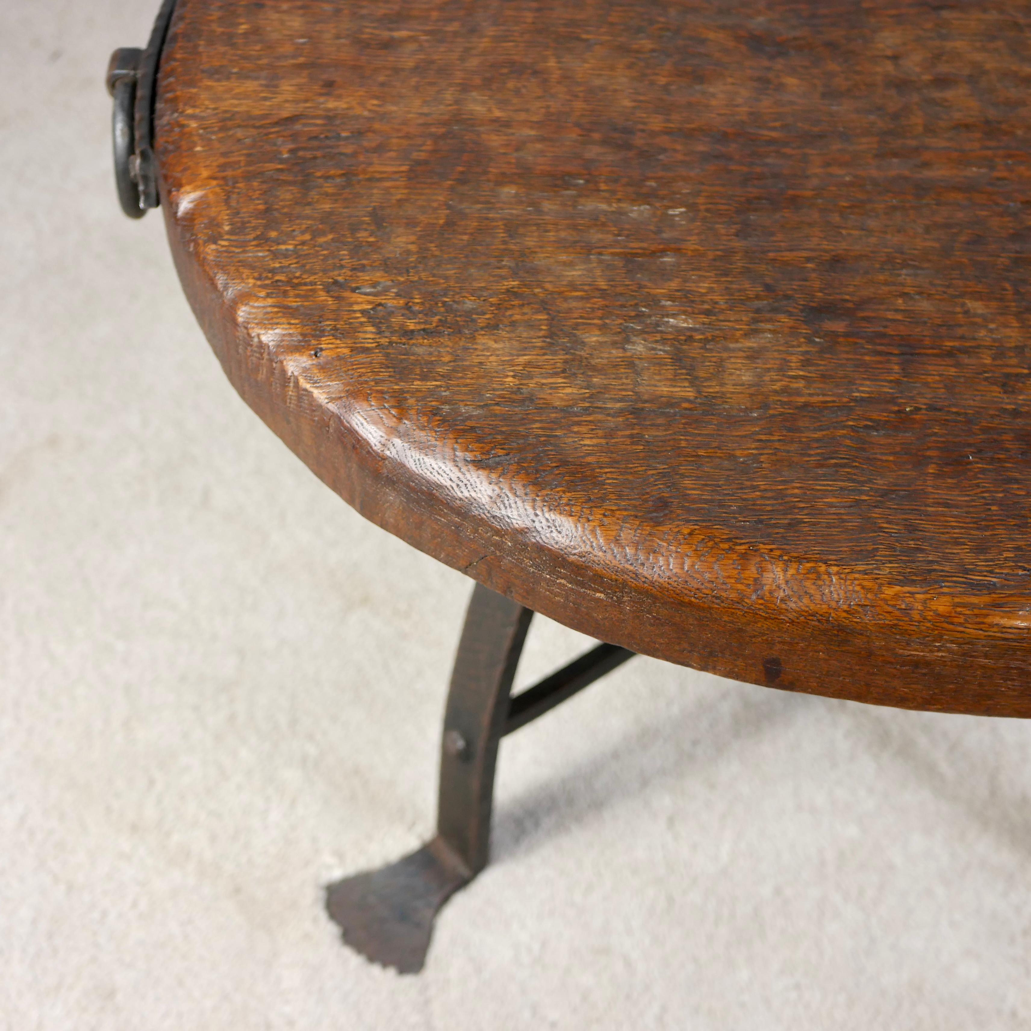 Mid-20th Century Brutalist round coffee table, wrought iron and solid oak, Belgium, 1950s For Sale