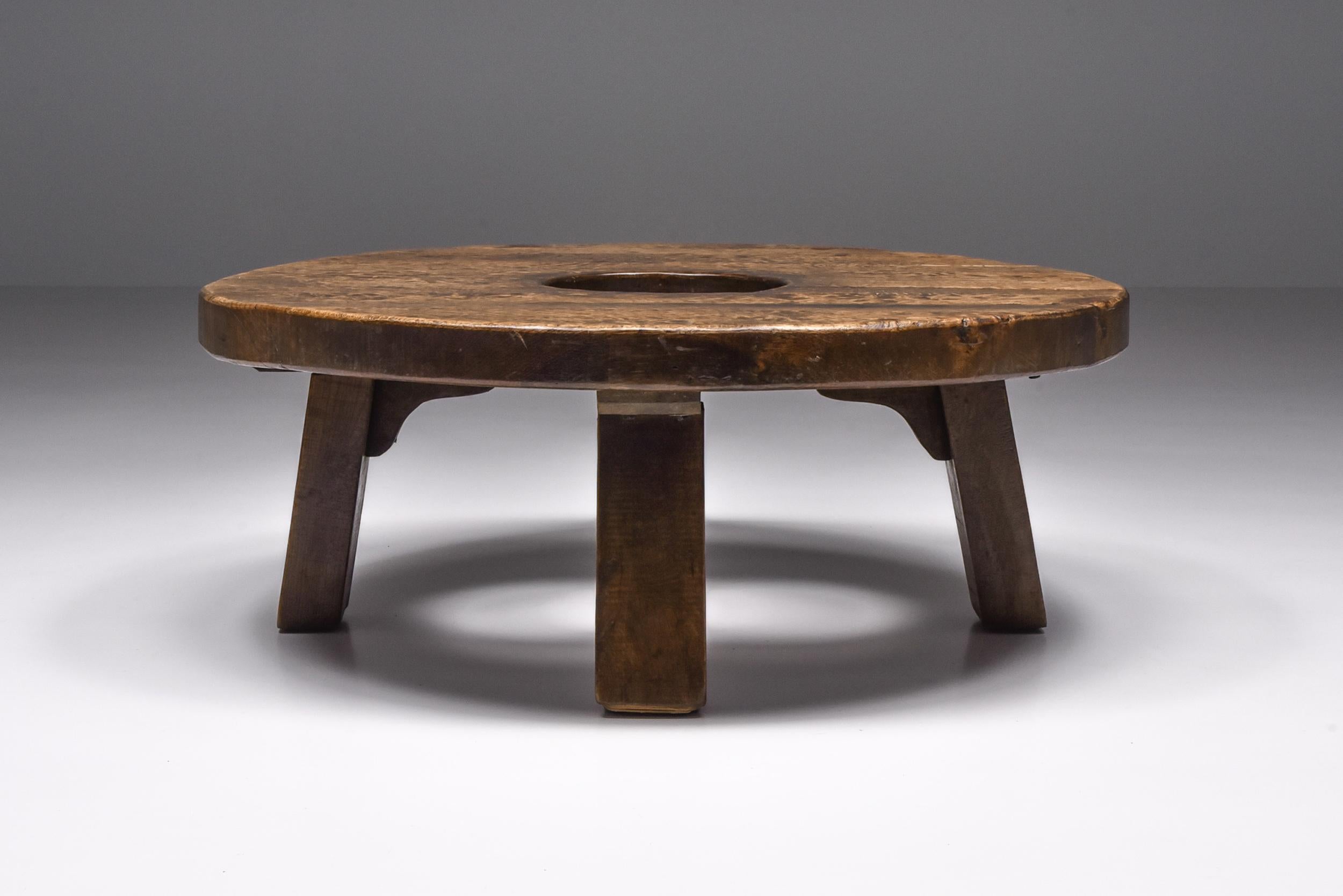 Brutalist Round with hole coffee table; Mid-century; Axel Vervoordt style; Wood; Side table; Craftsman 

Coffee table in round shape with a hole in the middle. The charismatic patina was inspired by the great principles of wabi-sabi. This piece