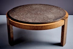 Brutalist round table with a dark fossil stone top Germany 1970s