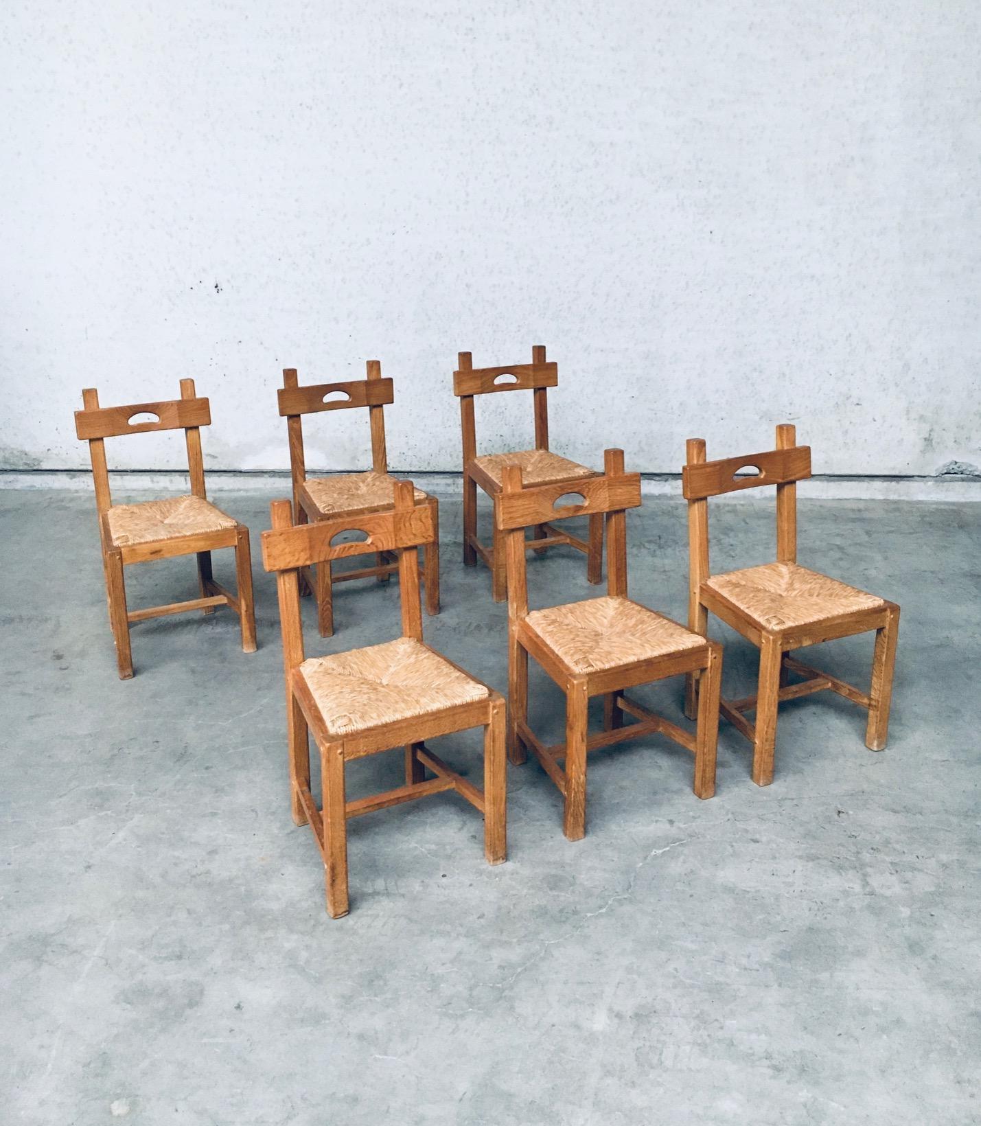Vintage Brutalist in design Rustic Oak Dining Chair Set, made in Belgium 1960s. Solid oak constructed chairs with rush woven seats. These are all in very good, original condition. Each chair measures 87cm x 45cm x 46cm.
Sold as a set of 6.