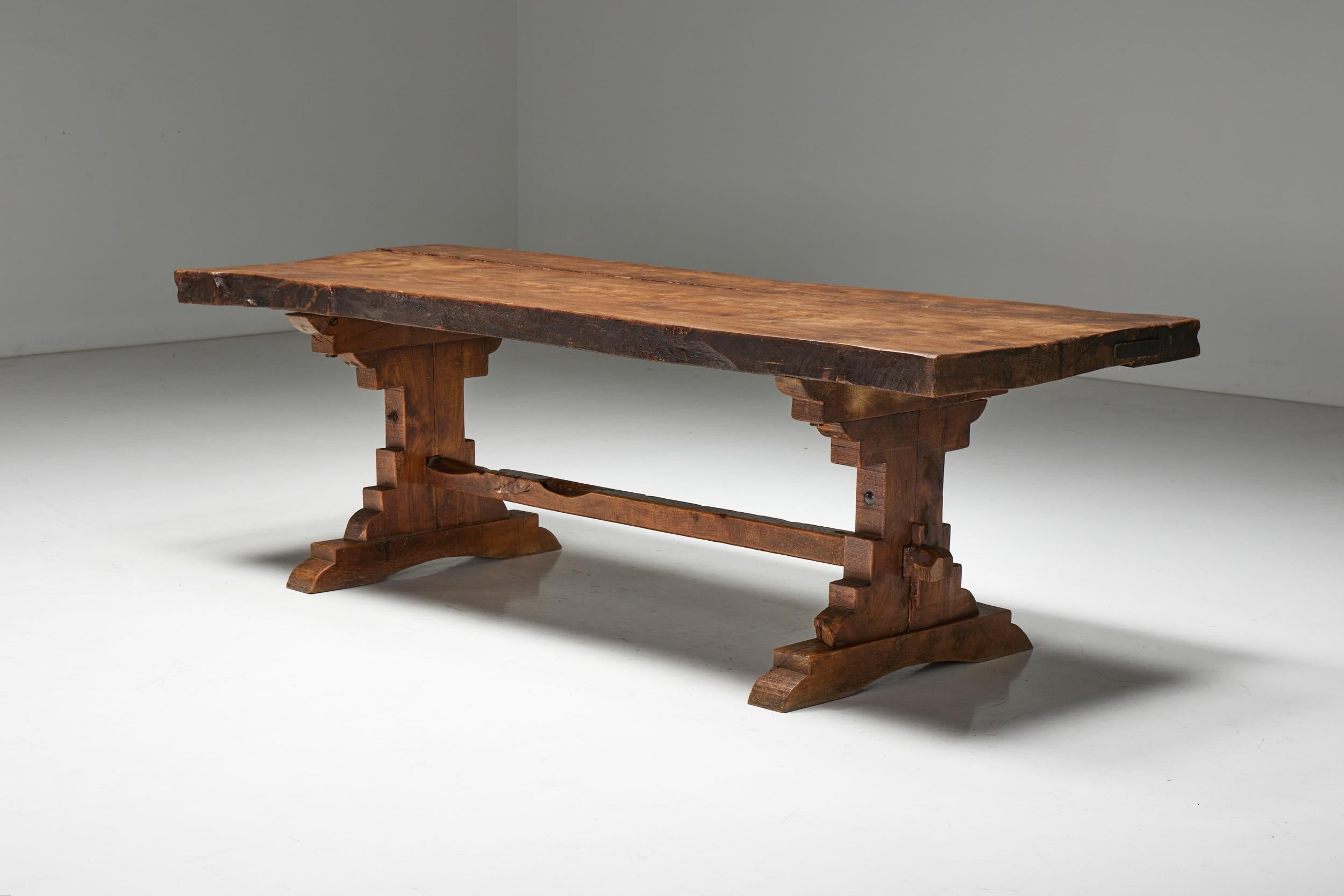 Monoxylite; Dining Table; Travail Populaire; France; Wabi Sabi; 19th Century; Rustic; Art Populaire; Wooden Table; Console Table; 

19th-century dining table, featuring a unique tabletop pattern of solid oak wood. The handcrafted sturdy table legs
