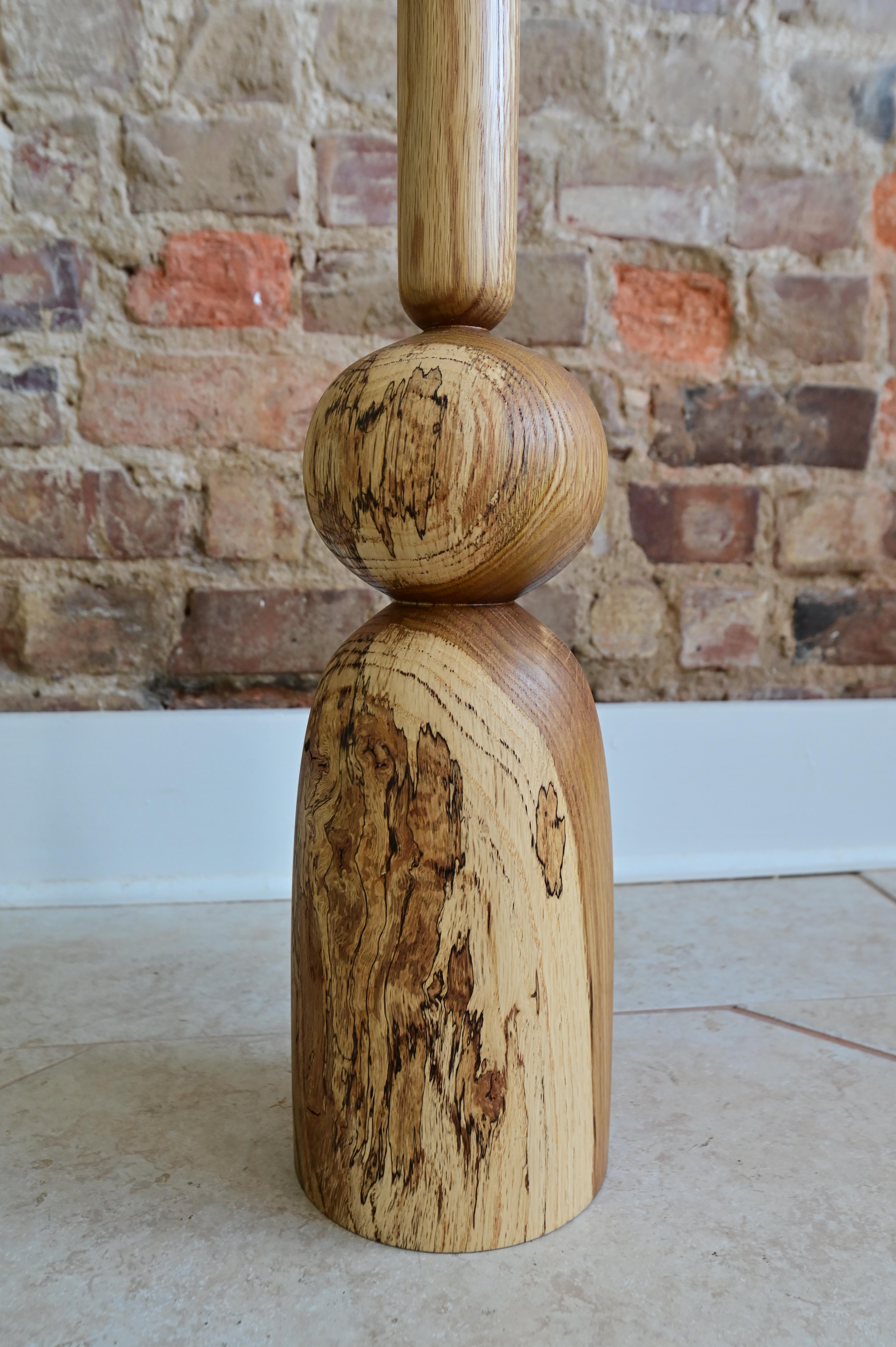 Unique sculpted floor vase from solid oak. 27