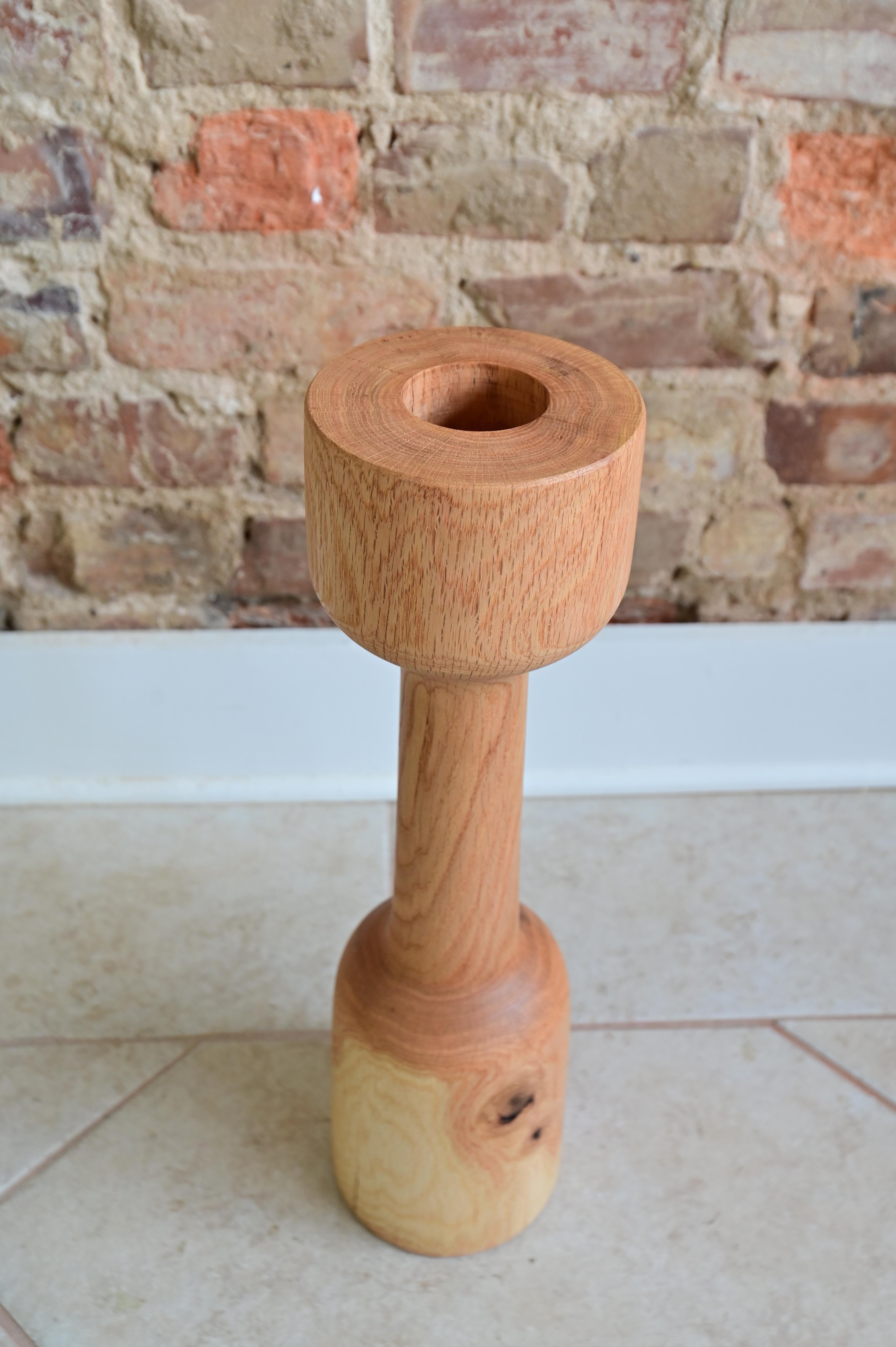 Unique hand sculpted floor vase from solid red oak. 20
