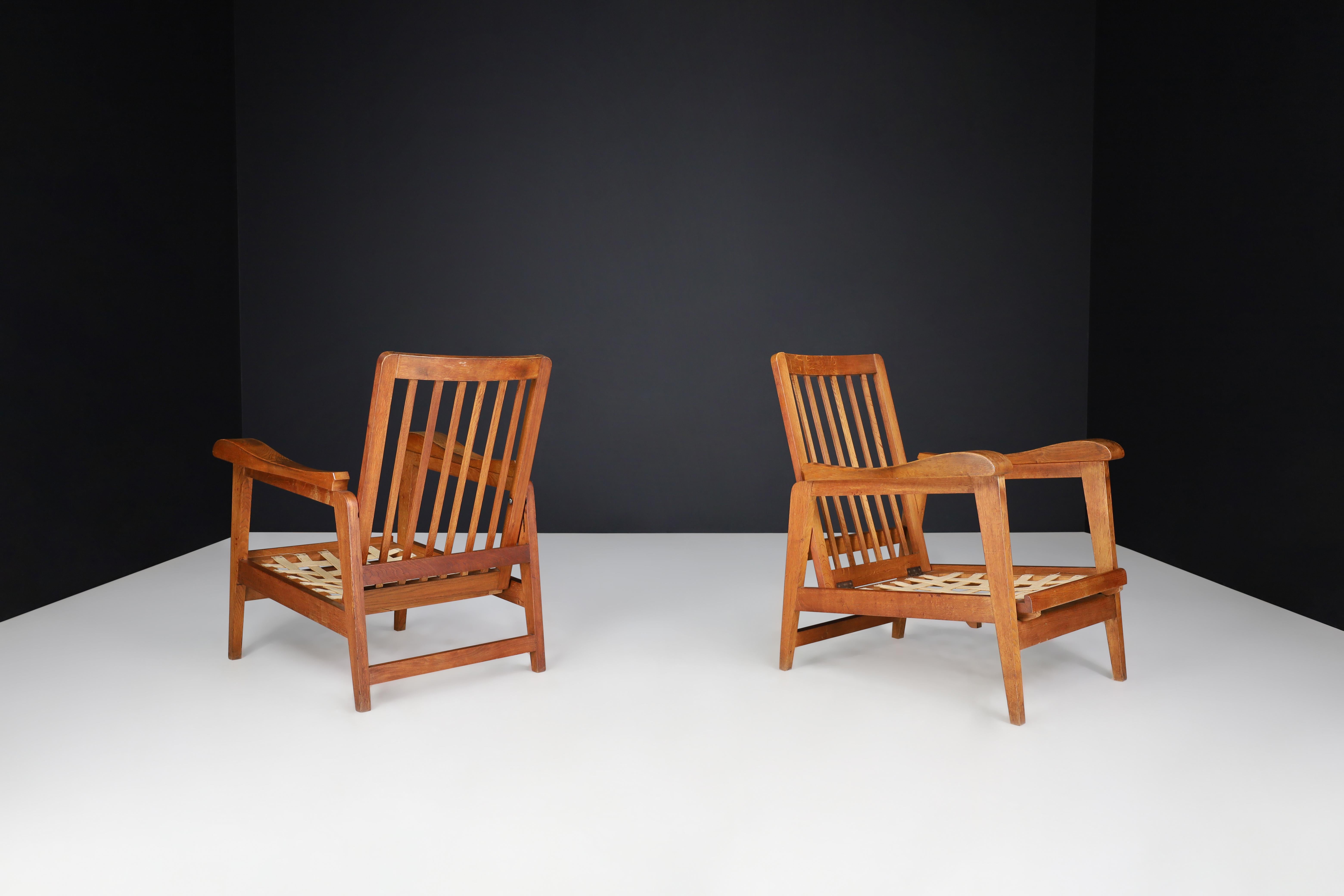 Mid-Century Modern Brutalist Sculptural Adjustable Lounge Chairs in Oak set of 2 , France, 1950s For Sale
