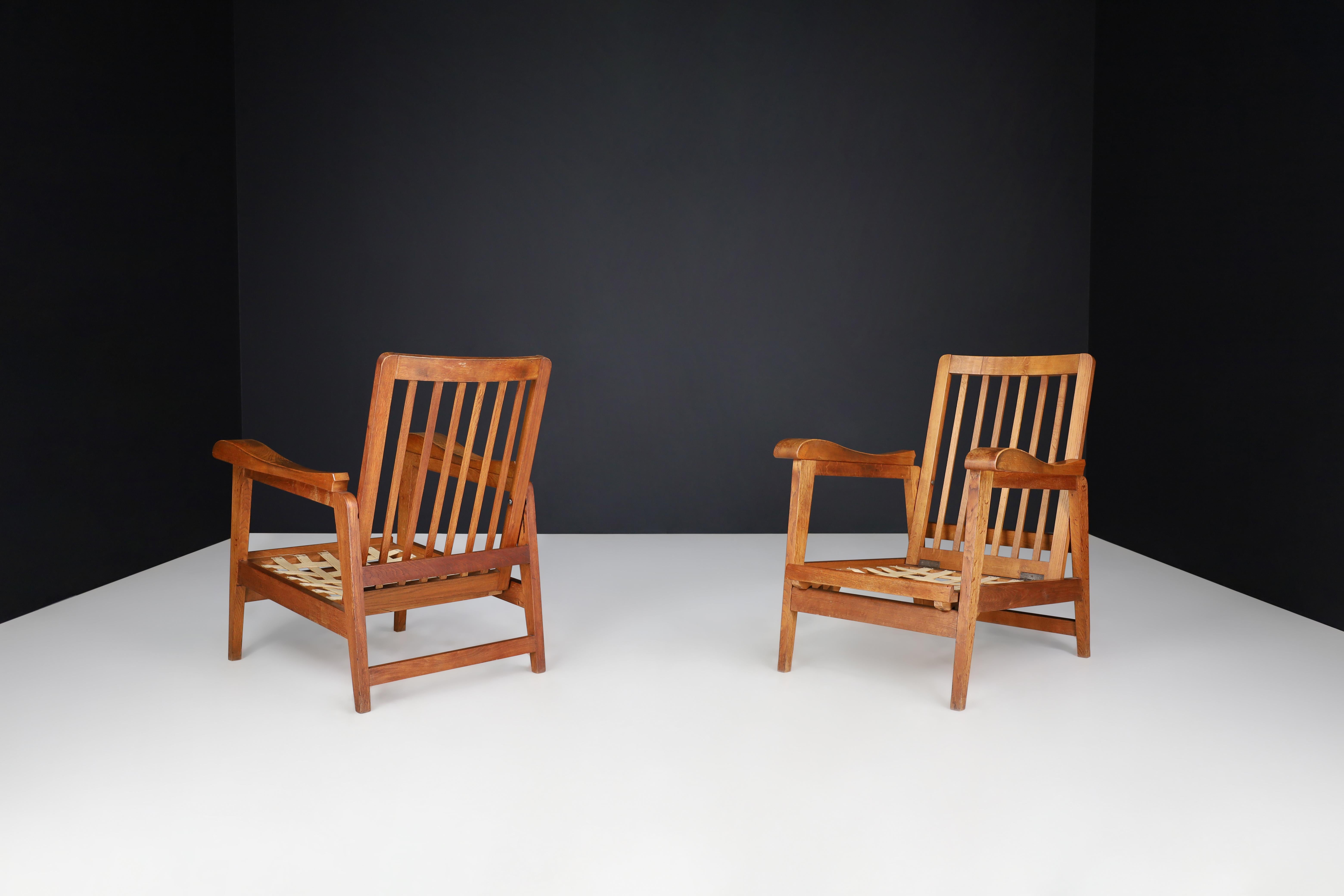 French Brutalist Sculptural Adjustable Lounge Chairs in Oak set of 2 , France, 1950s For Sale