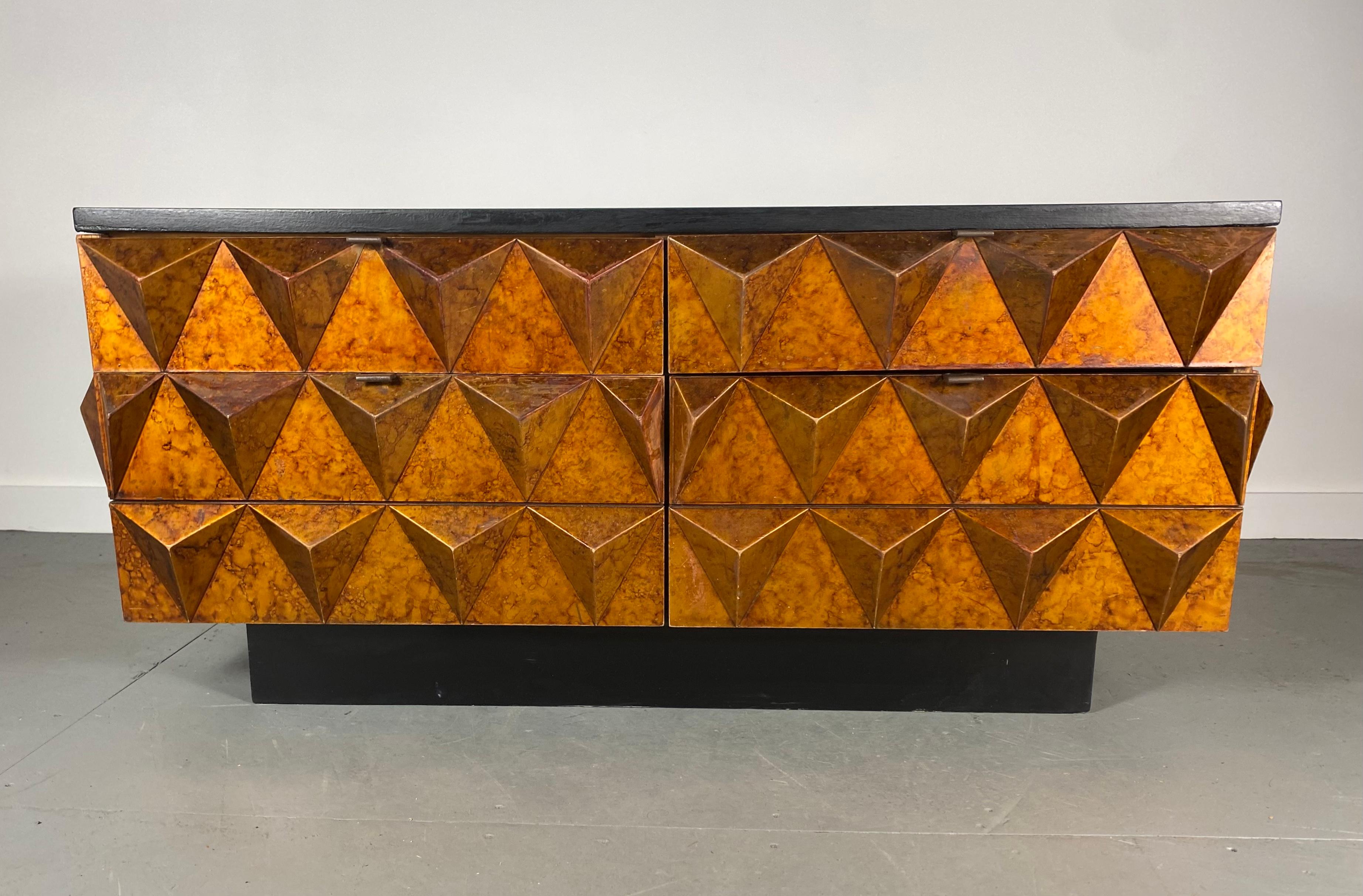 Brutalist sculptural diamond front and sides, dresser, credenza, console table. Faux tortoise, oil spot finish, truly stunning in person, very unusual design, cabinet consists of four generous Size drawers. Bronzed metal pulls.Black lacquer top and