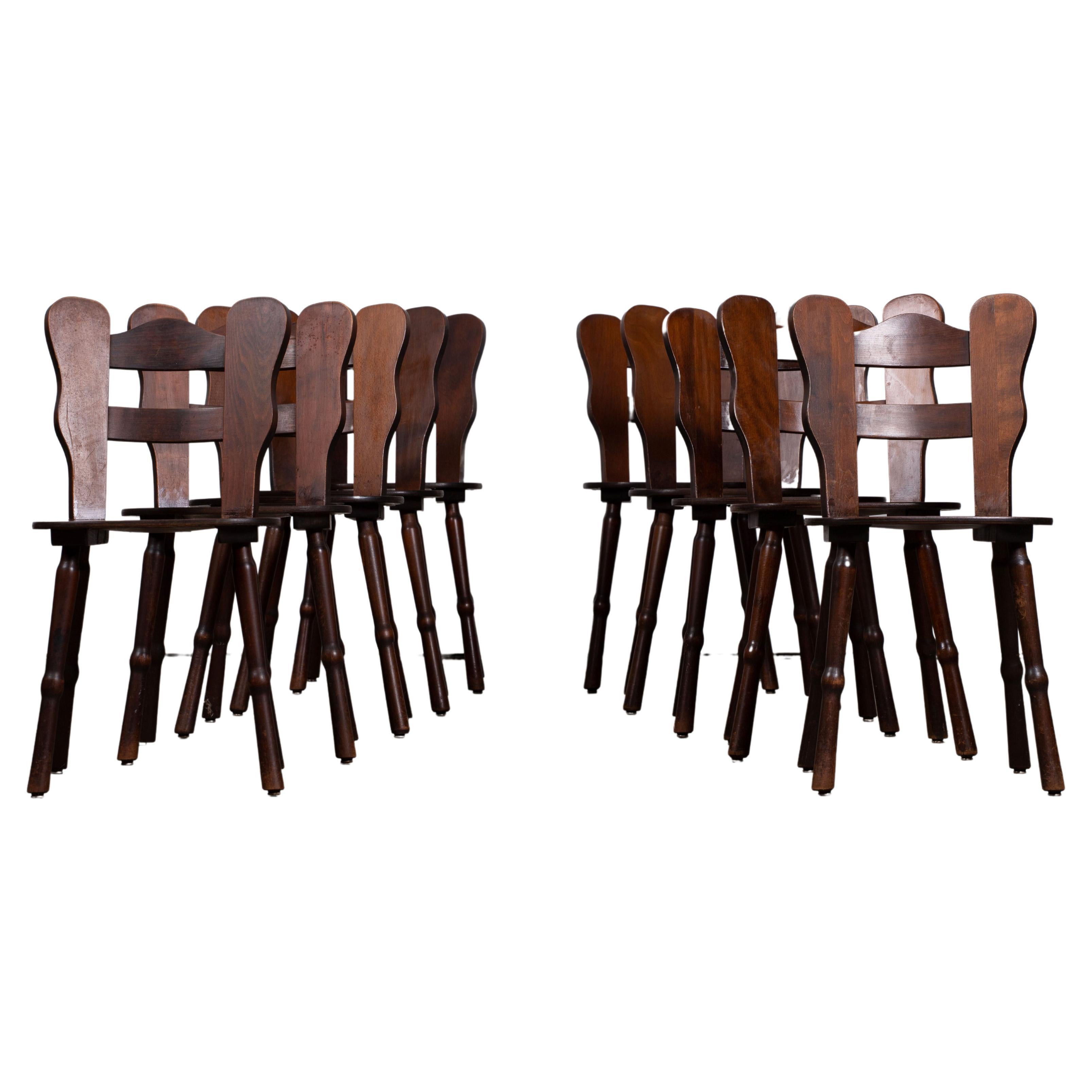This set of six French Brutalist dining chairs in solid oak was created in the 1940s.

