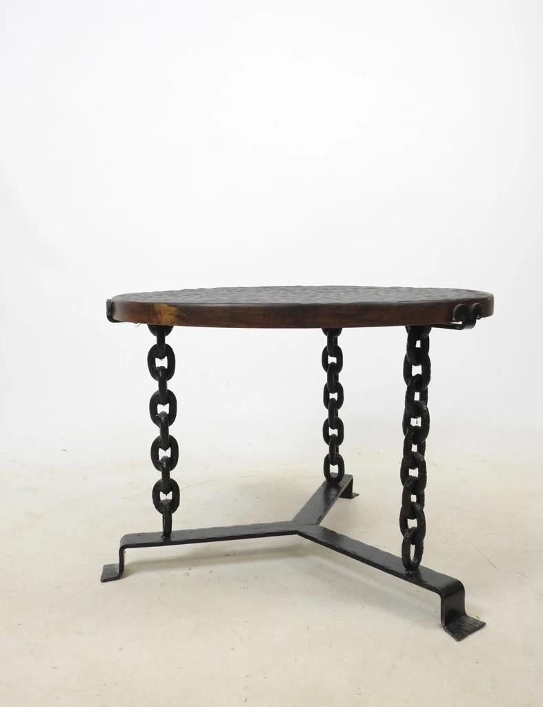 Brutalist 1970 side table in black welded chain and solid oak top, gouged in the style of Jean Touret. 