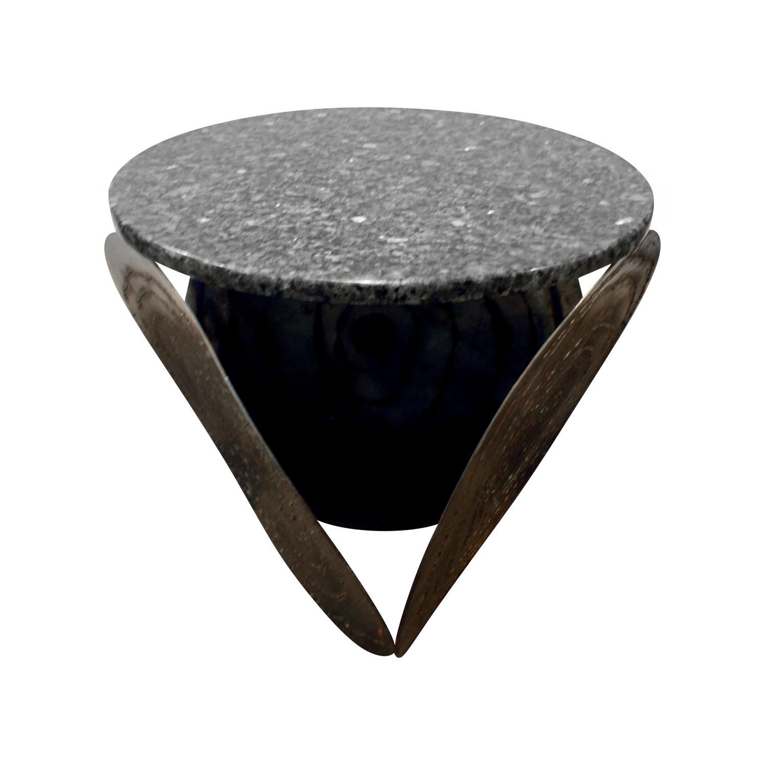 Artisan brutalist side table with welded steel disc design and granite top, American, 1970s.