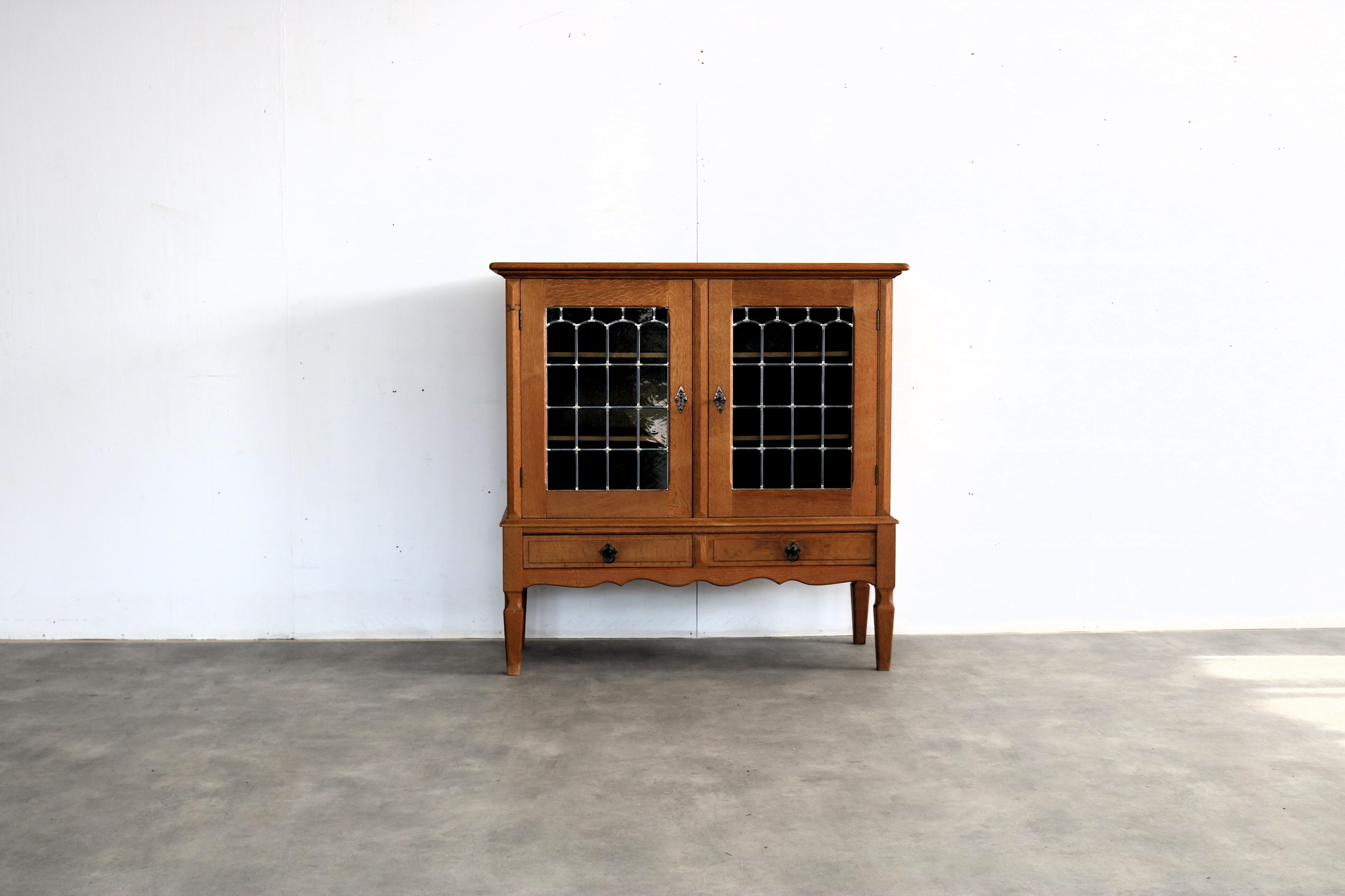 Brutalist display cabinet  cabinet  1960s  Danish

period  1960s
design  unknown  style Henning Kjaernulf  Denmark
condition  good  minor signs of wear
size  109 x 110 x 45 cm (H x W x D)

details  oak; glass;

item number  2927