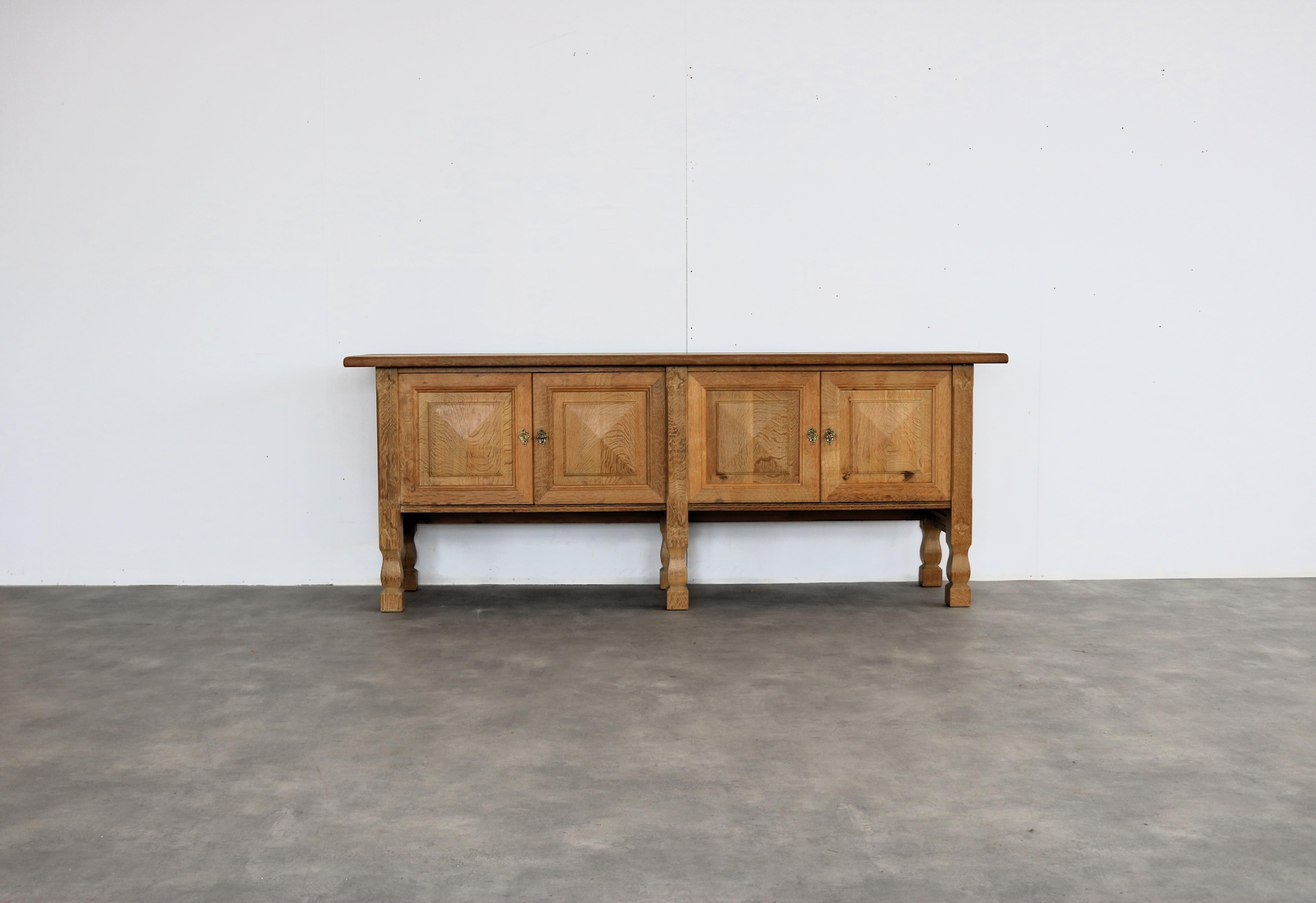 brutalist sideboard  sideboard  oak  1960s  Danish

period  1960s
design  unknown  Denmark
condition  good  light signs of use
size  79 x 200 x 51 (hxbxd)

details  oak;

item number  2794