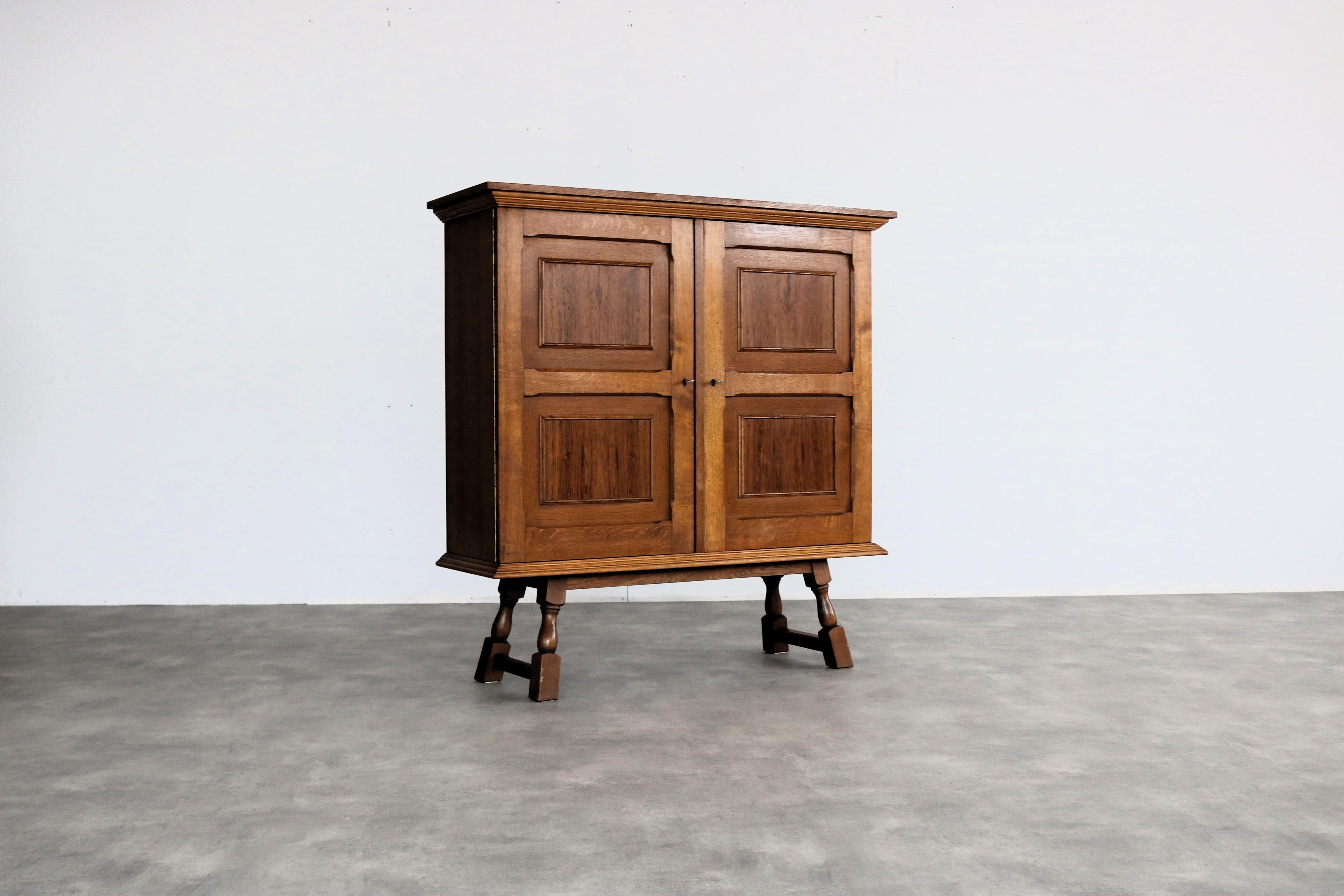 Brutalist sideboard  wall cupboard  1950s

period  1950s
design  unknown  Sweden
condition  good  light signs of use
size table  129.5 x 125 x 41.5 (hxwxd)

details  oak;

article number  2251