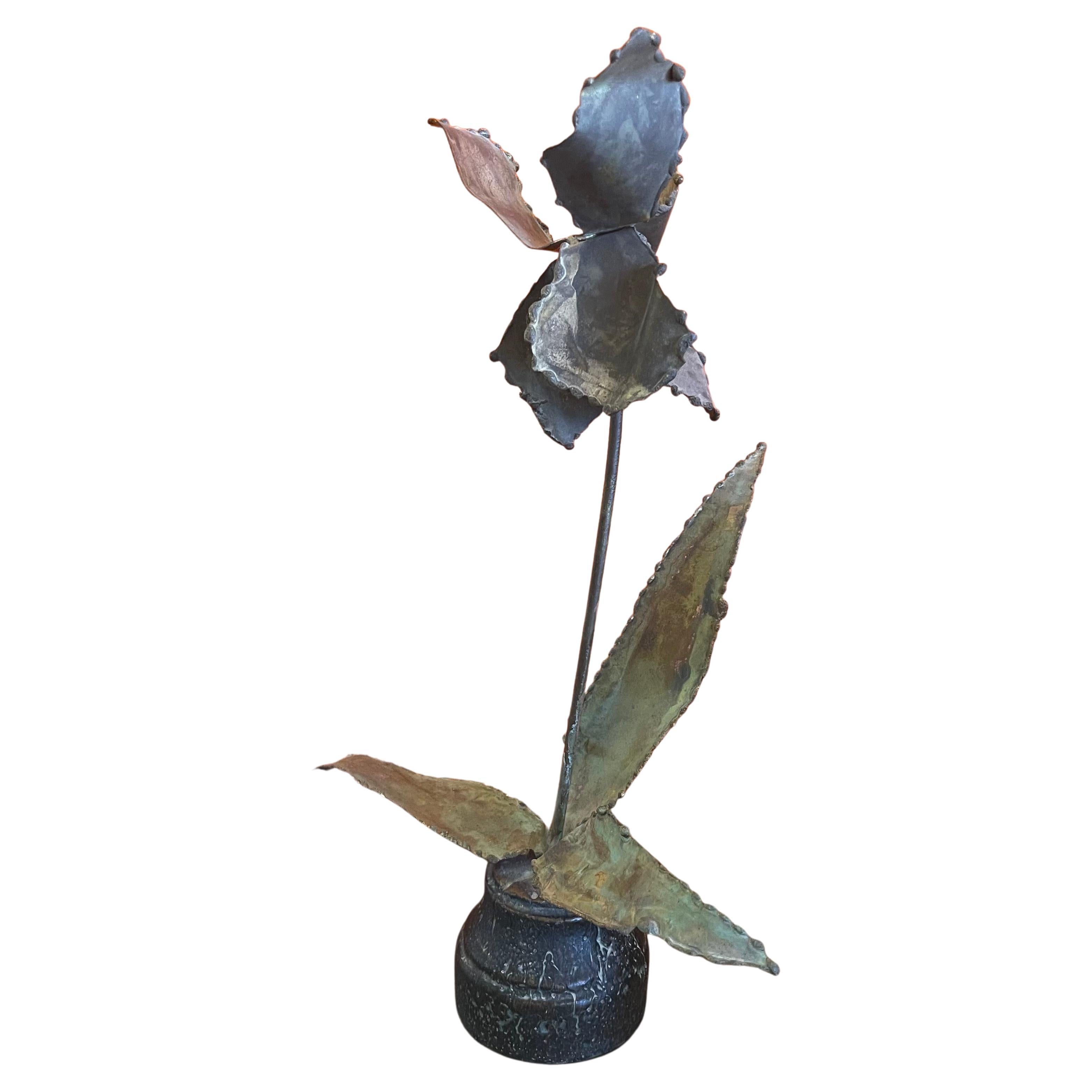 Brutalist raw metal torch cut flower sculpture, circa 1983. The sculpture is in very good vintage condition and measures 10