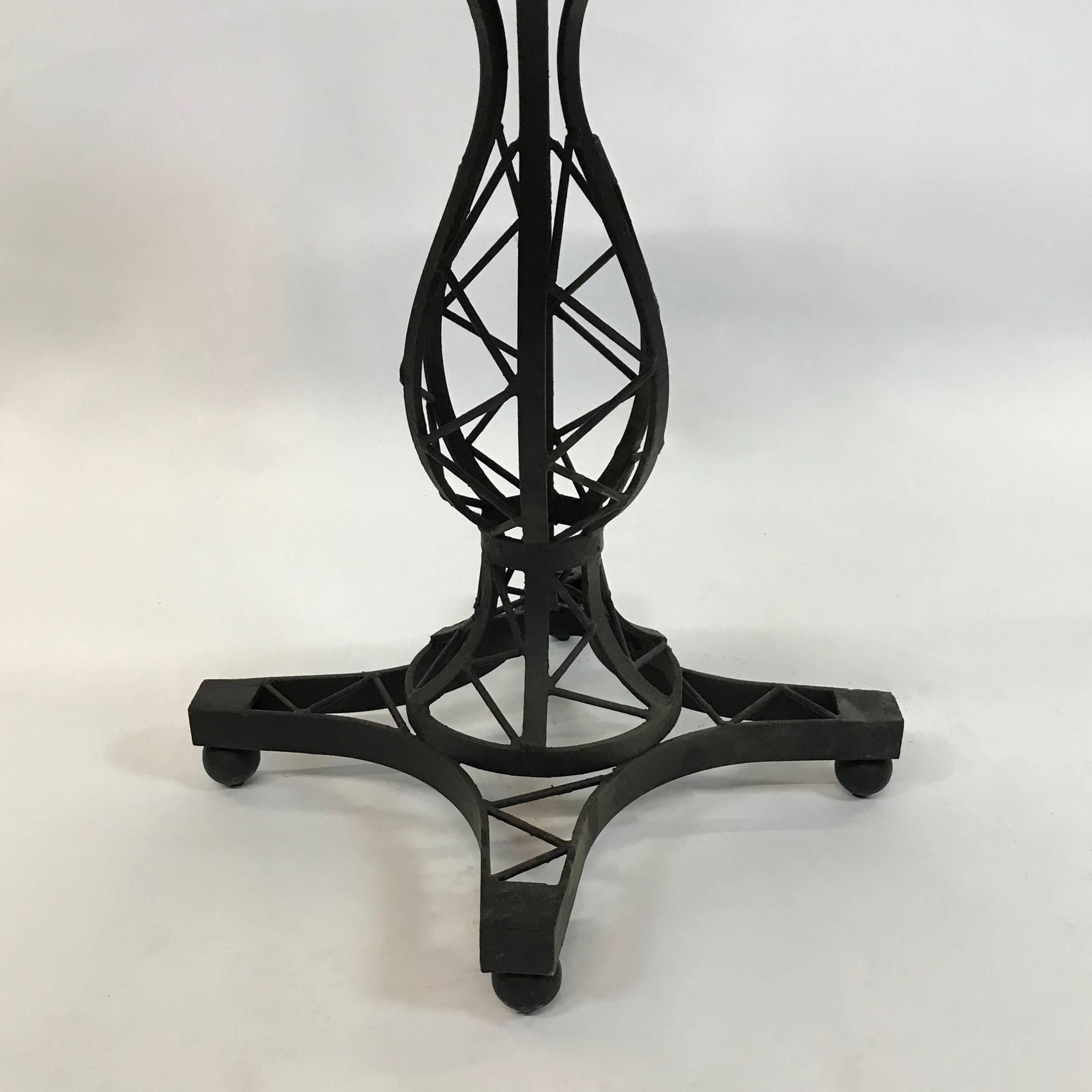 wrought iron pedestal dining table
