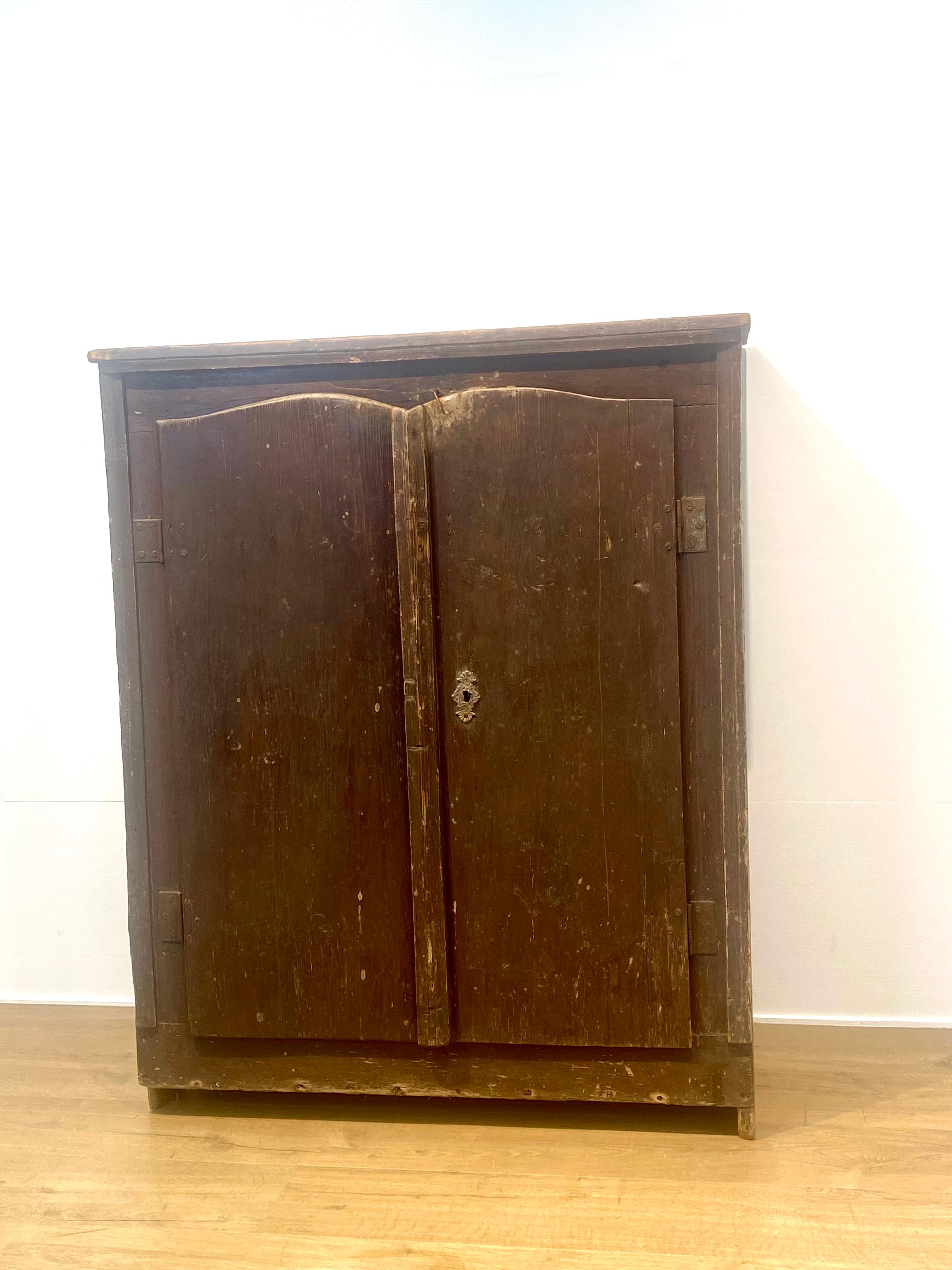 Beautiful East-European Small 2-doors Kitchen Cabinet,
late 19 th Century,
nice ,old and original Brown patina ,
very powerful piece of furniture for your kitchen,
2 shelves,
simple design, piece of furniture in Wabi Sabi Stylee