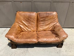 Brutalist sofa in elm and cord stitching circa 1960